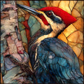 a Pileated Woodpecker hammering on a — ceramic art tile