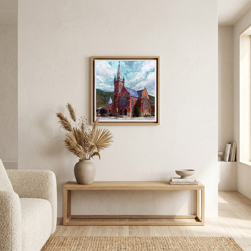 In the living room, above the sofa.
