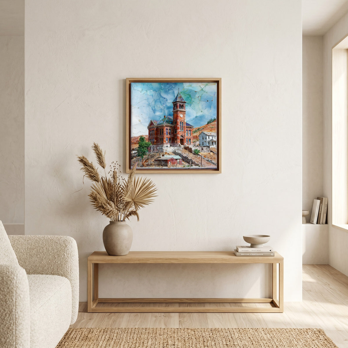 In the living room, above the sofa.