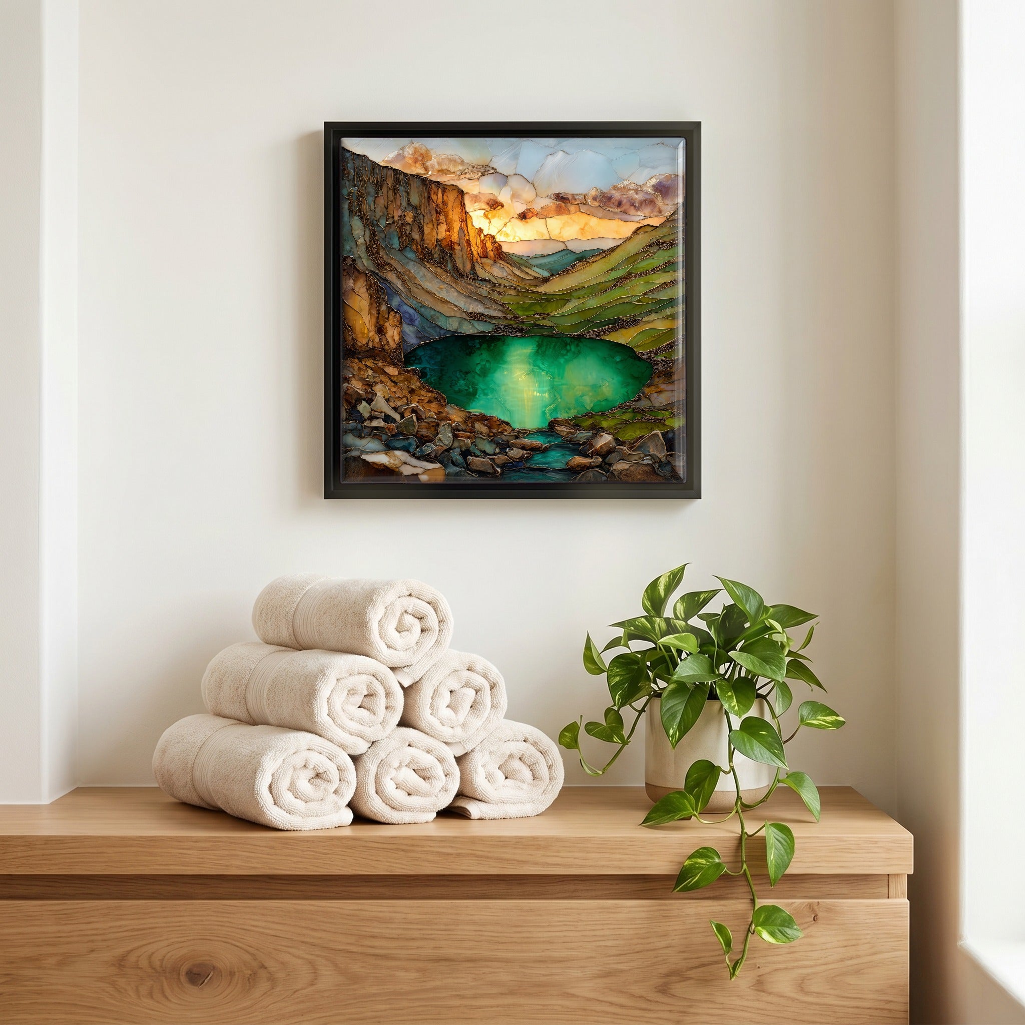 Above the linens, in a slim black surround.
