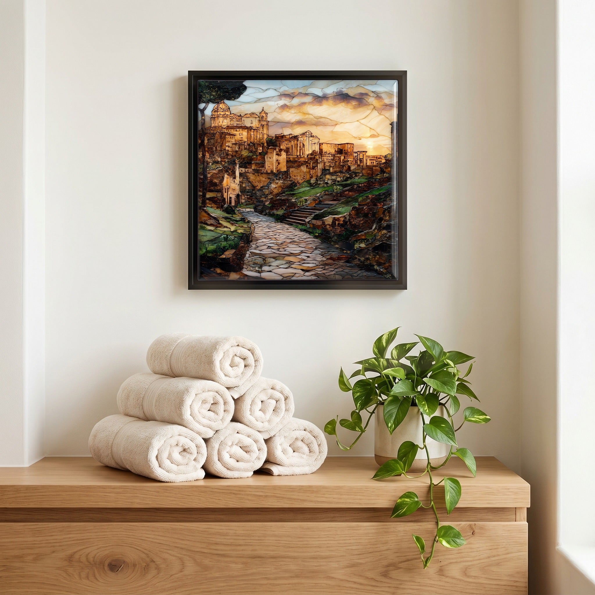 Above the linens, in a slim black surround.