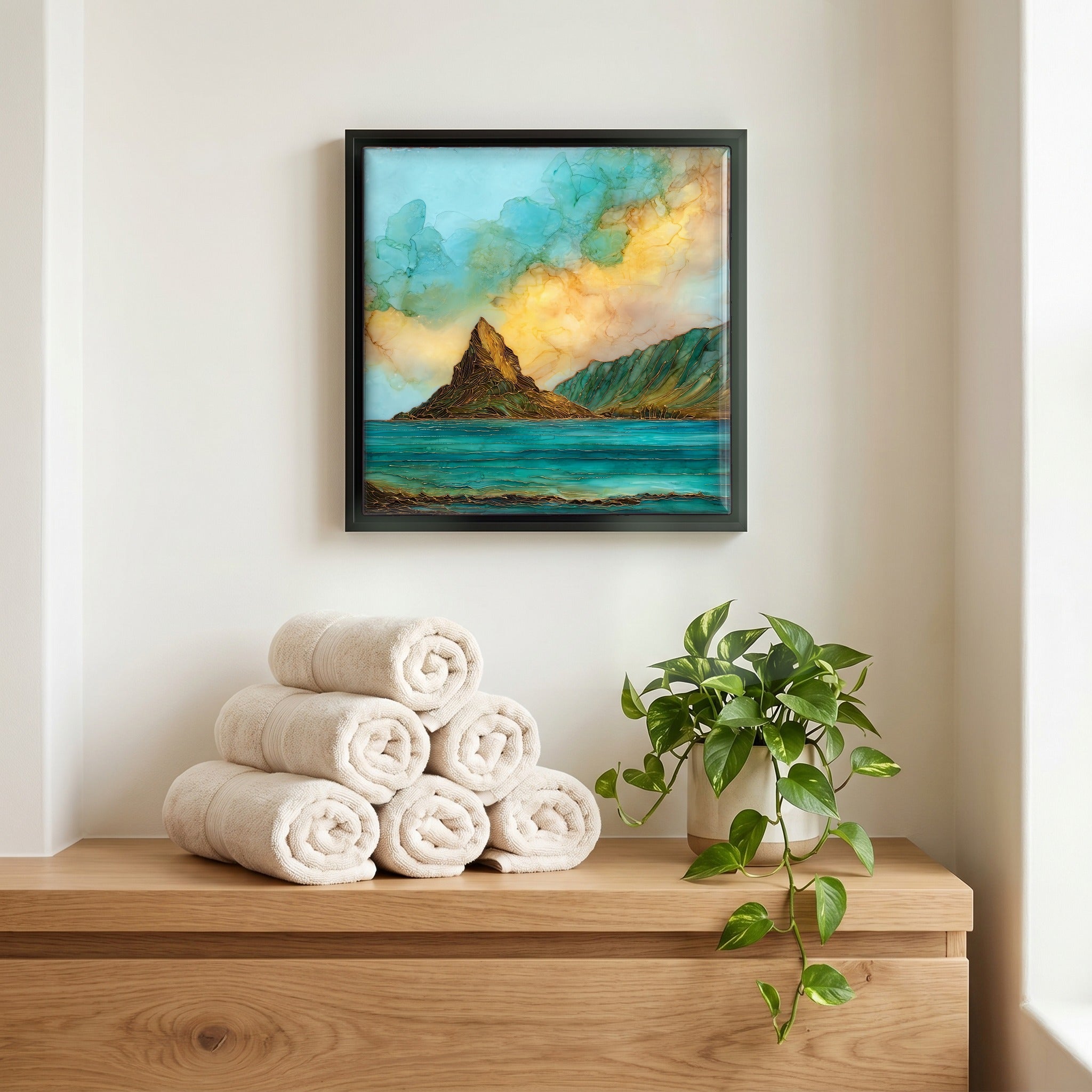 Above the linens, in a slim black surround.