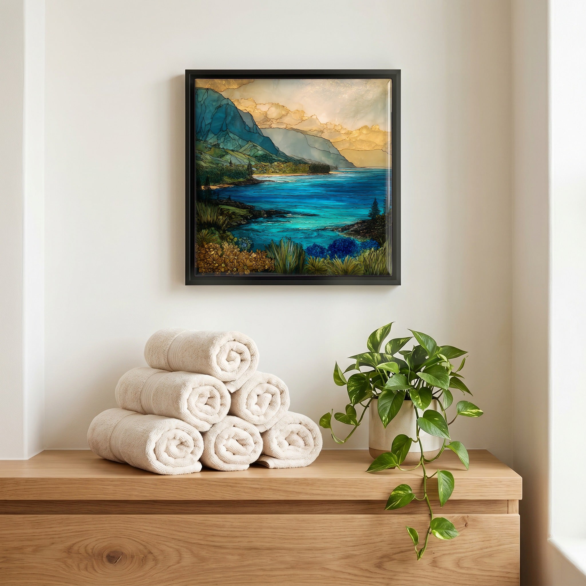Above the linens, in a slim black surround.
