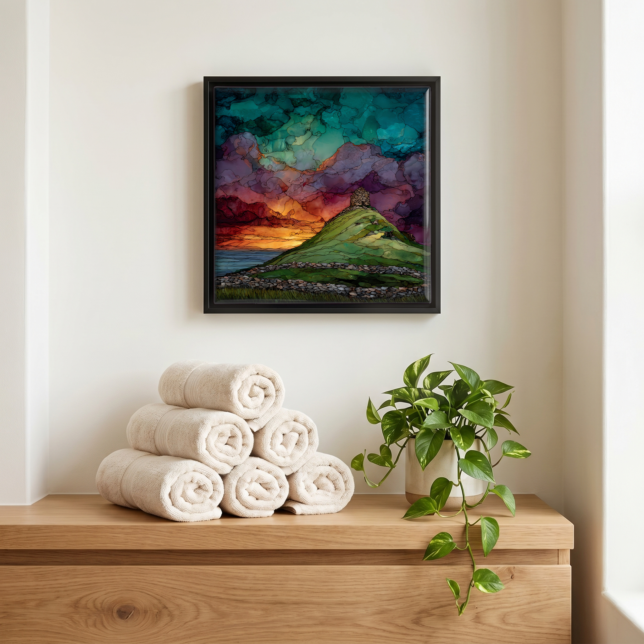 Above the linens, in a slim black surround.