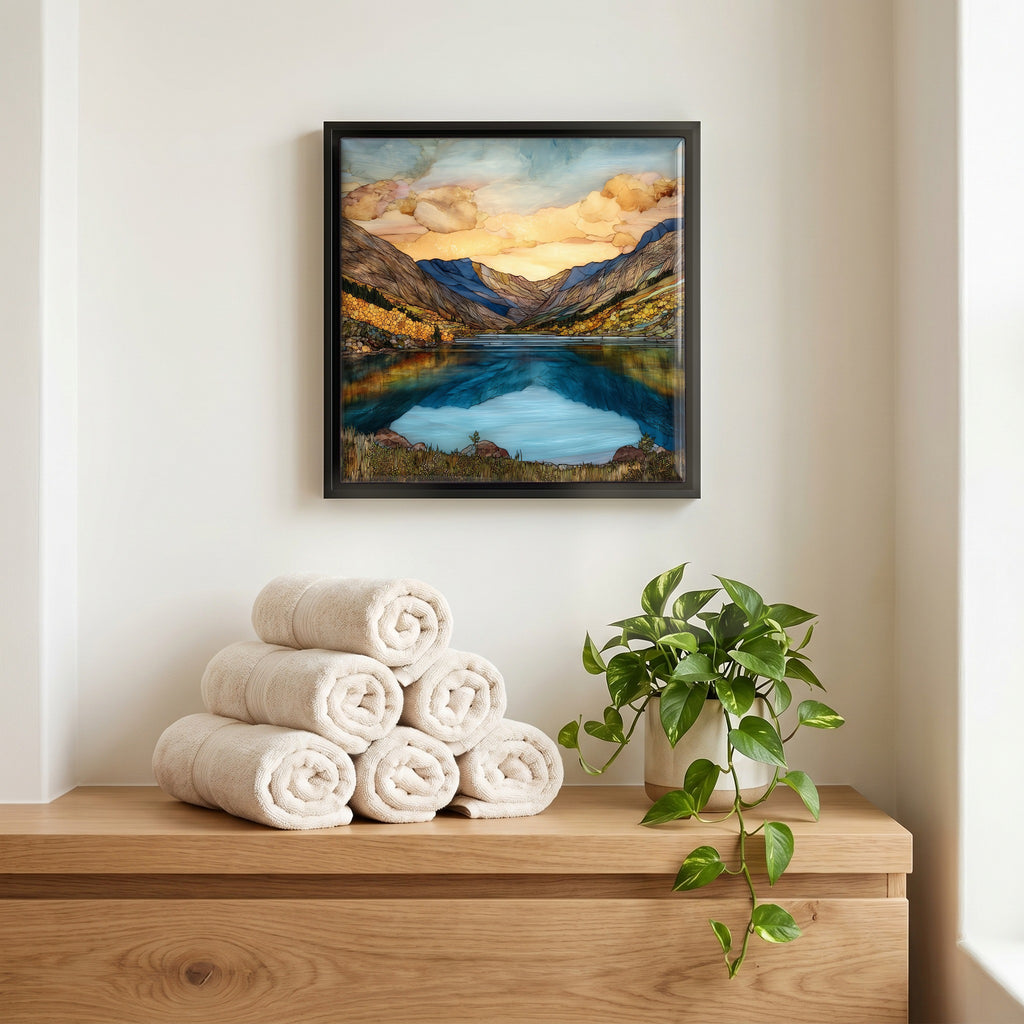 Above the linens, in a slim black surround.