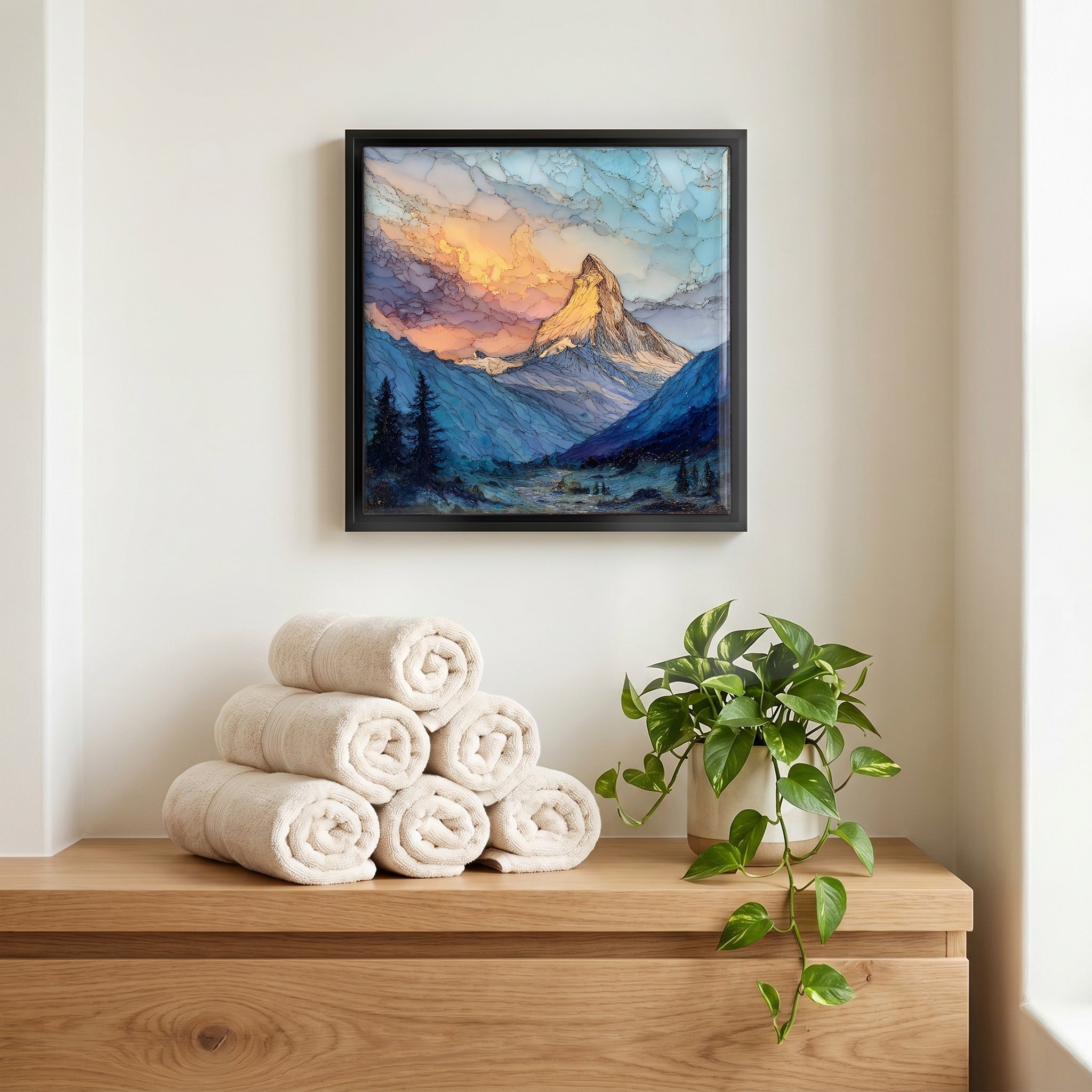 Above the linens, in a slim black surround.