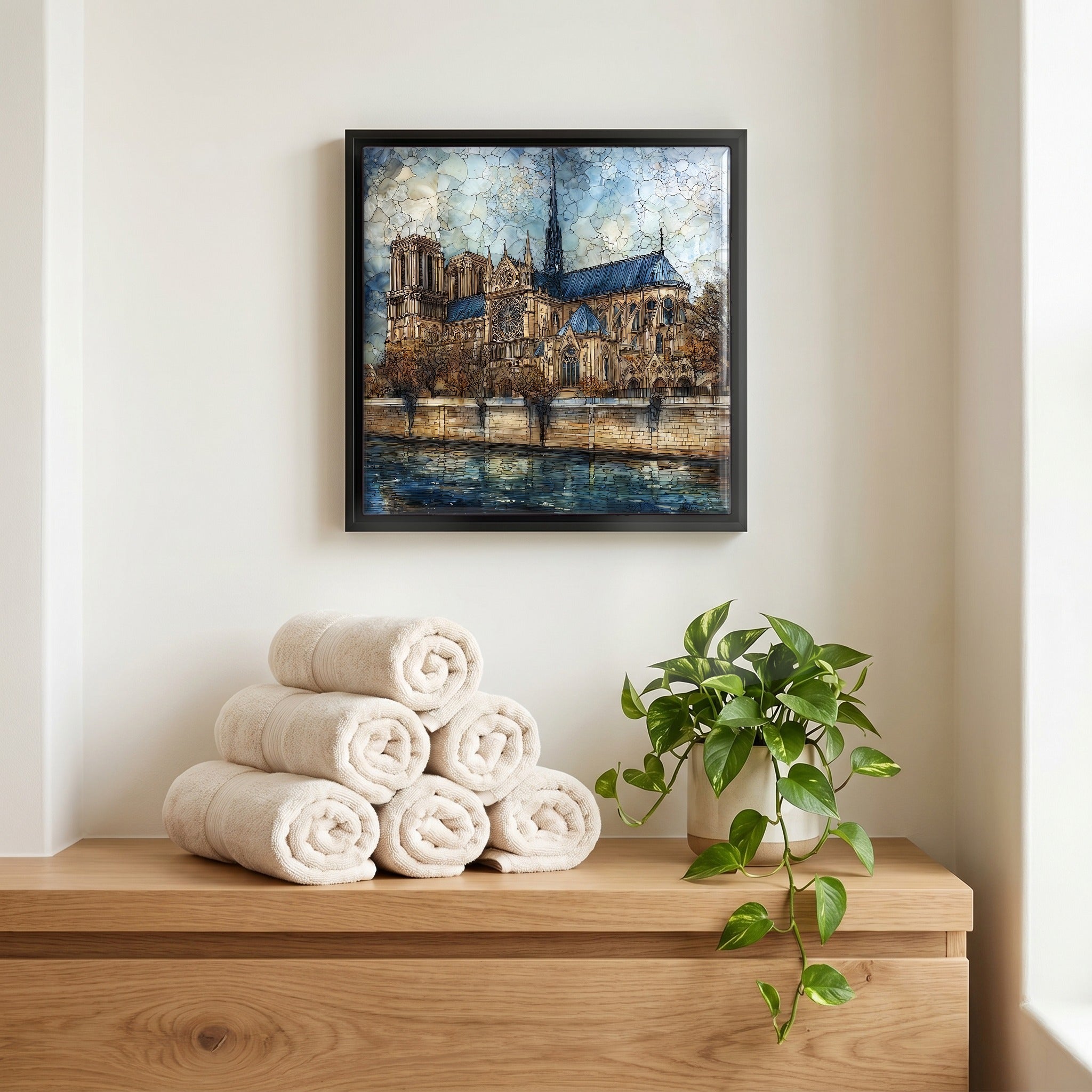Above the linens, in a slim black surround.