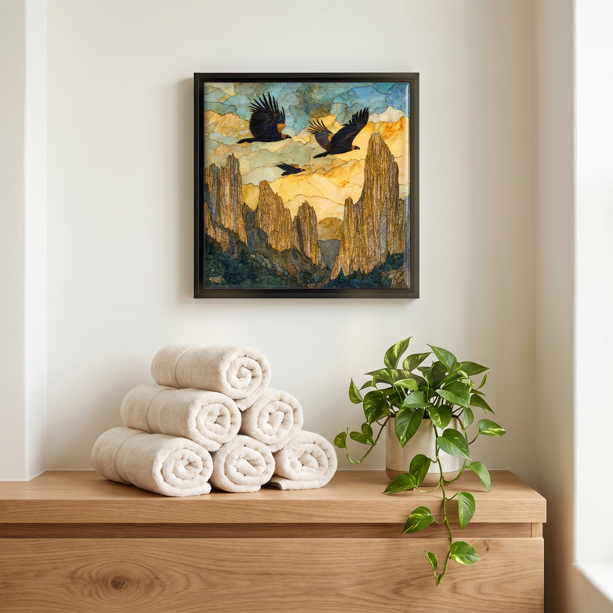 Above the linens, in a slim black surround.