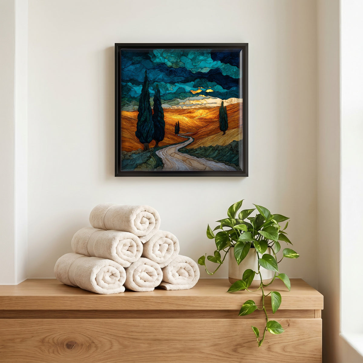 Above the linens, in a slim black surround.