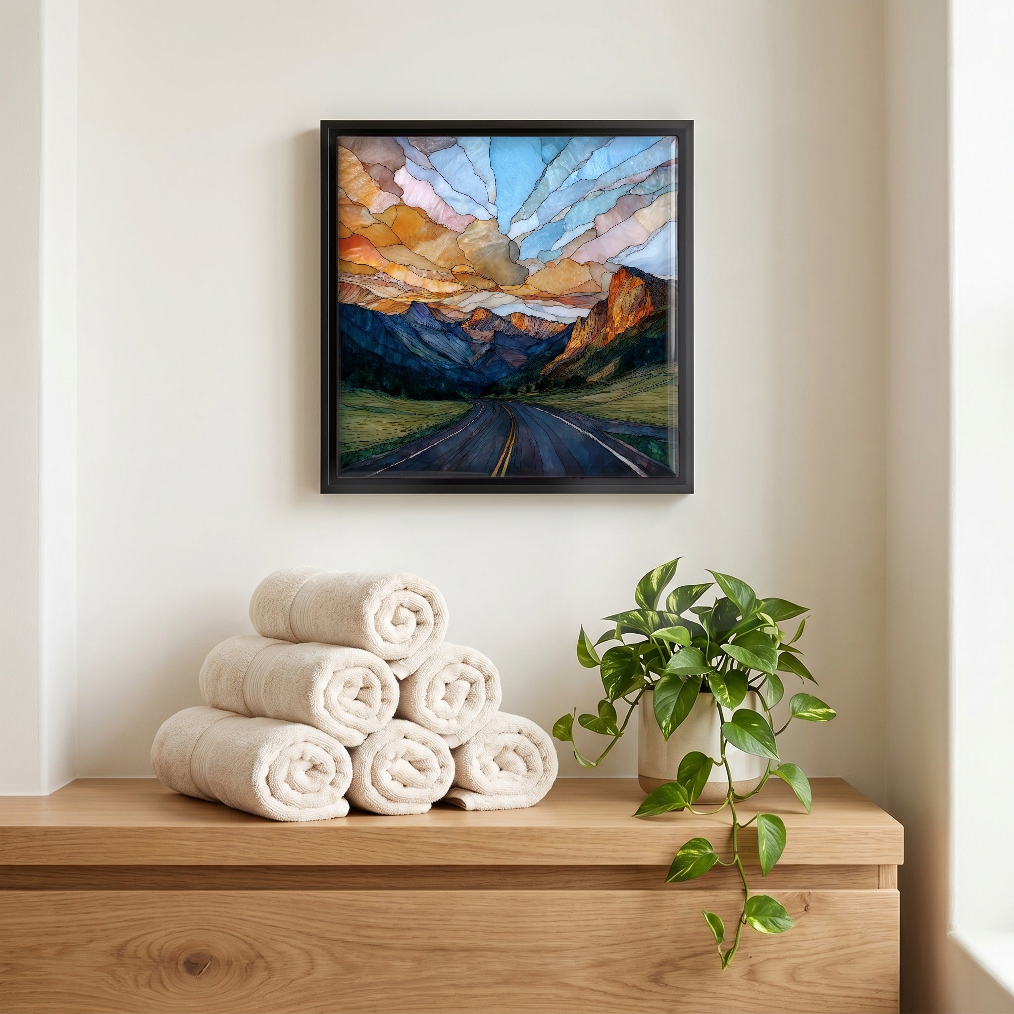 Above the linens, in a slim black surround.