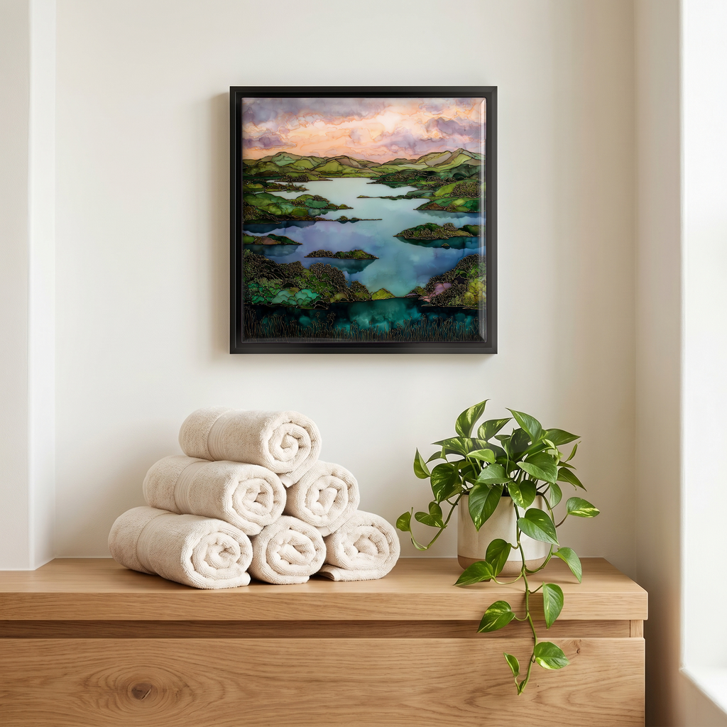 Above the linens, in a slim black surround.