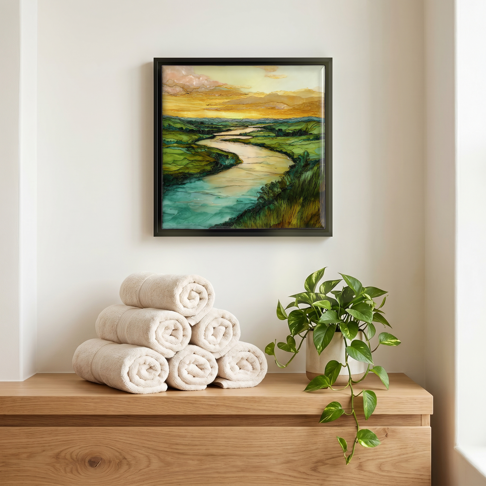 Above the linens, in a slim black surround.
