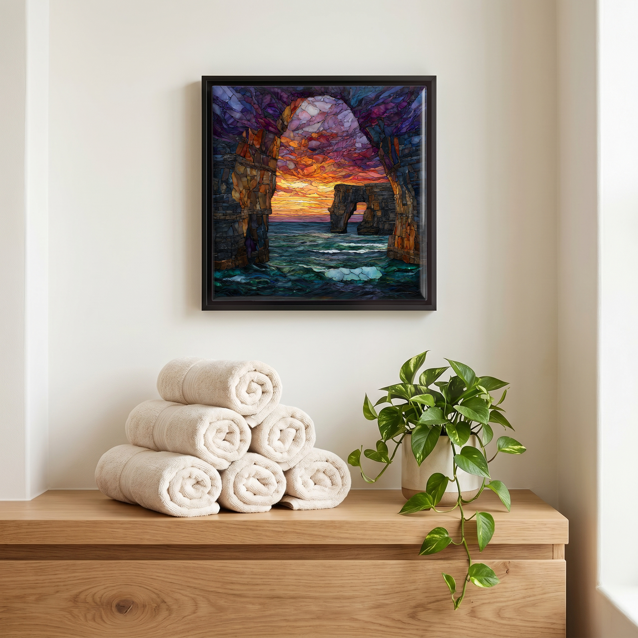 Above the linens, in a slim black surround.