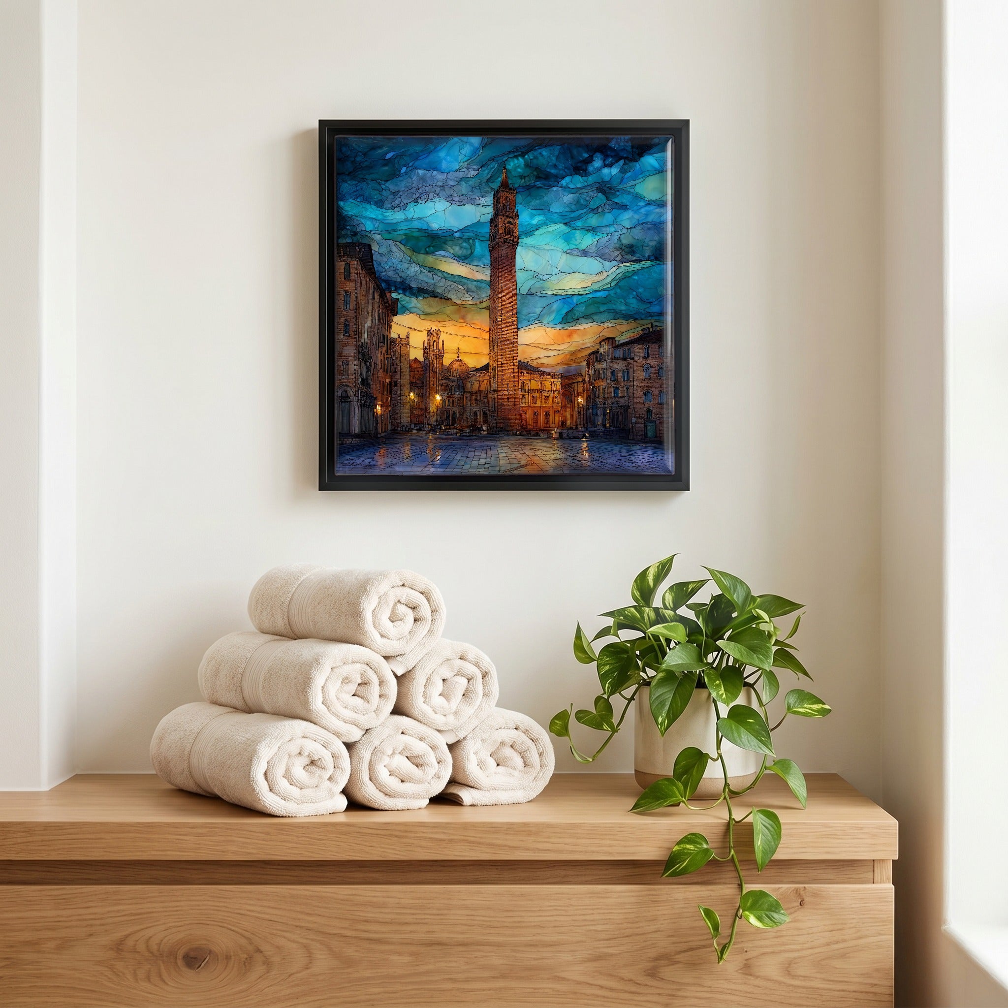 Above the linens, in a slim black surround.