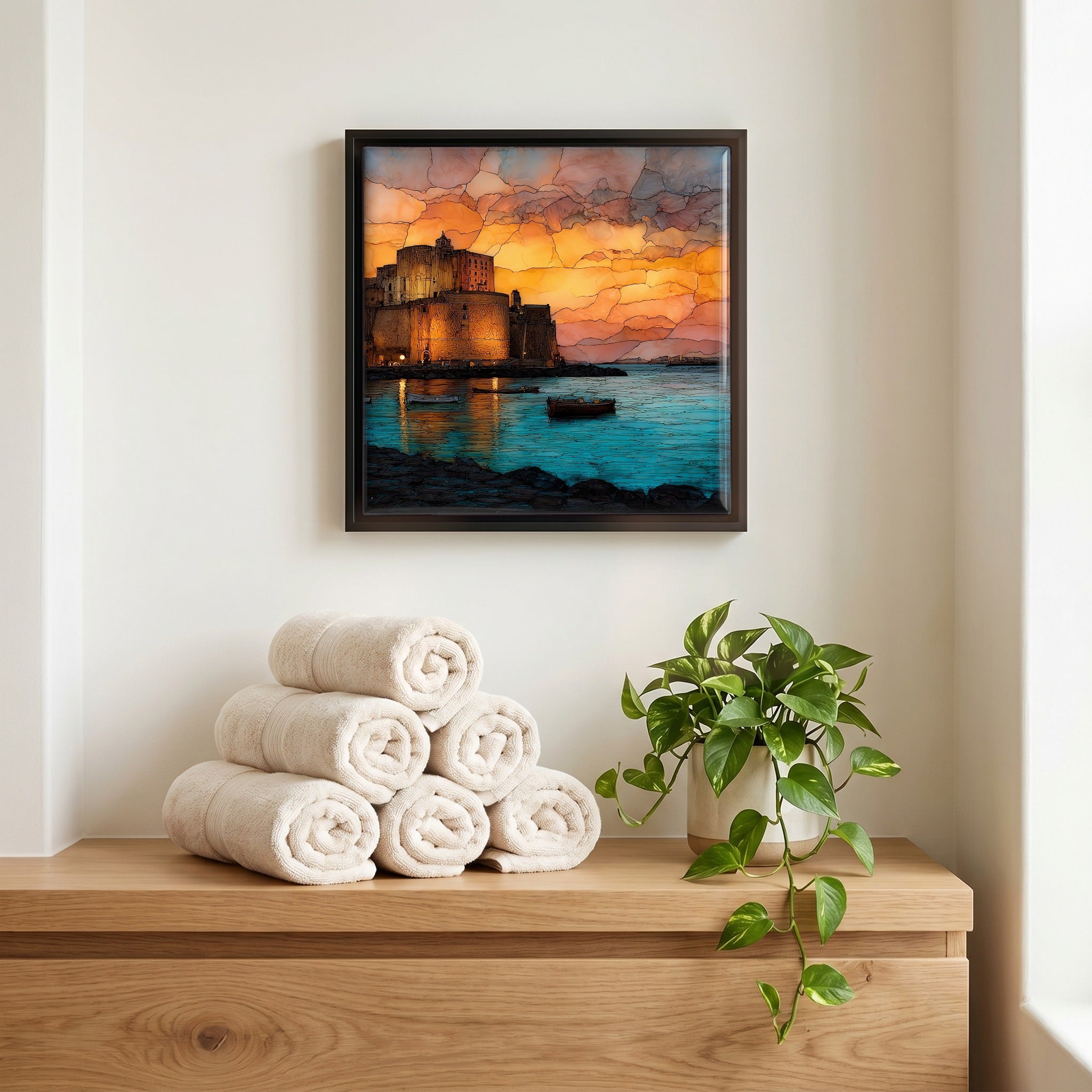 Above the linens, in a slim black surround.