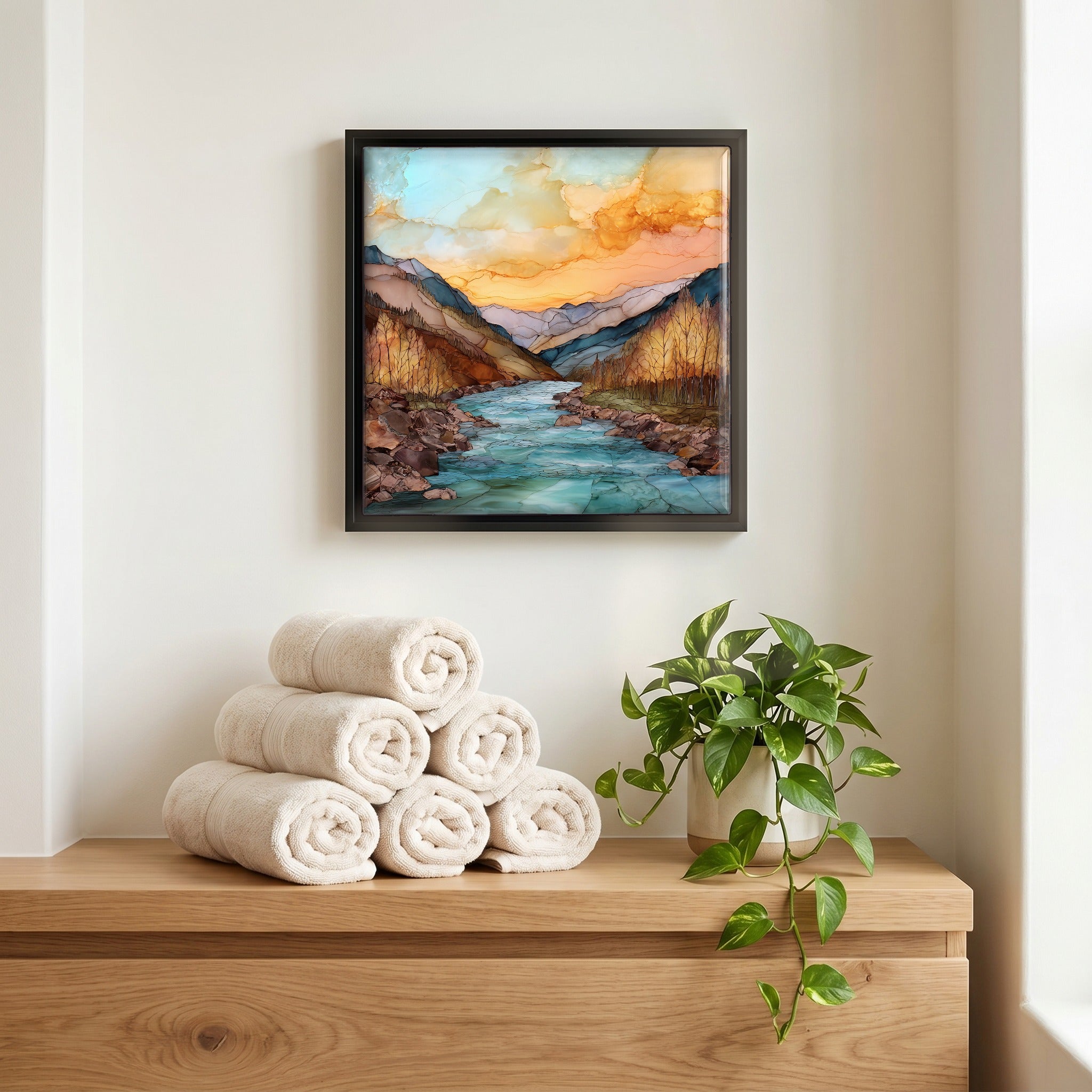 Above the linens, in a slim black surround.