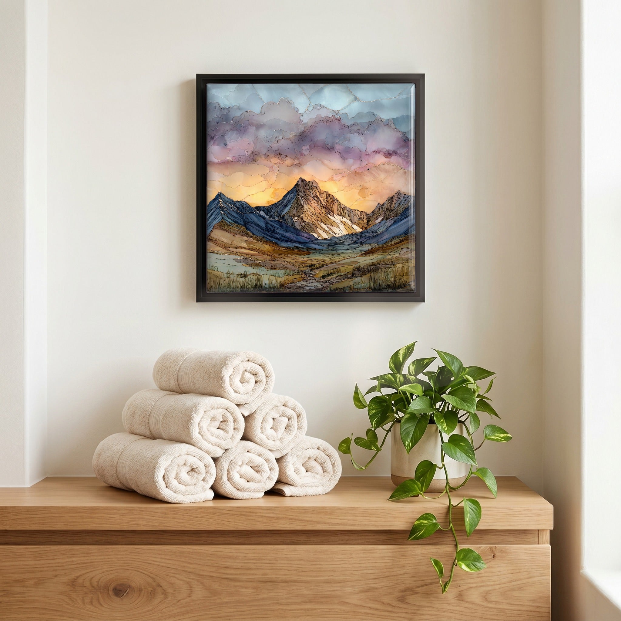 Above the linens, in a slim black surround.