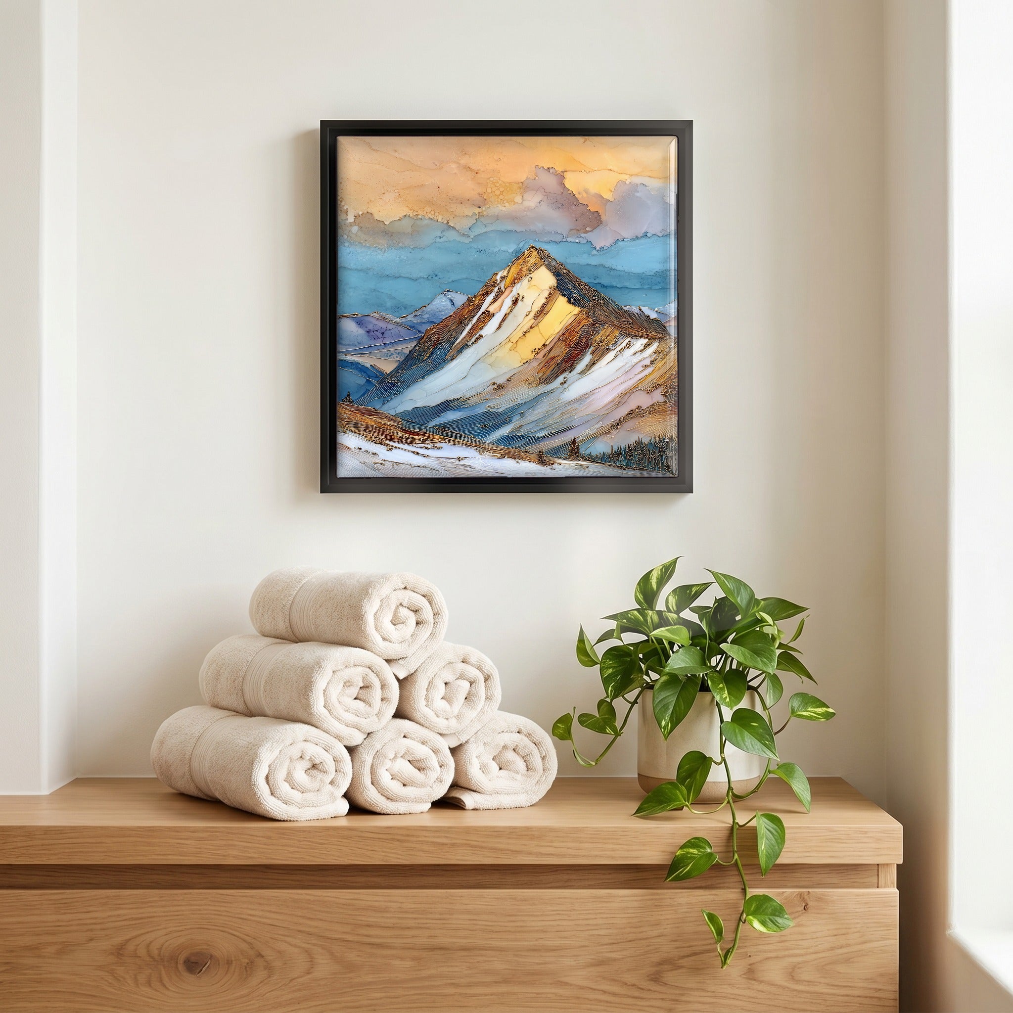 Above the linens, in a slim black surround.