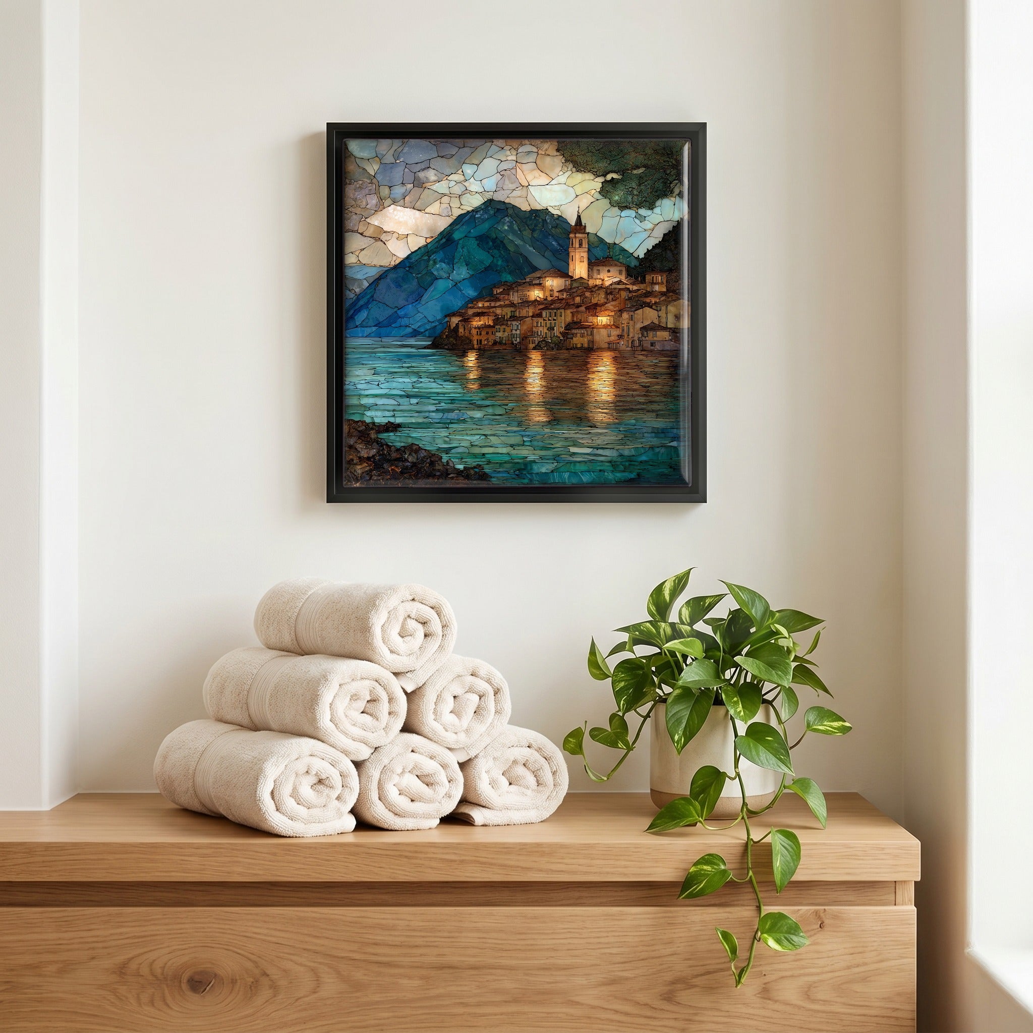 Above the linens, in a slim black surround.