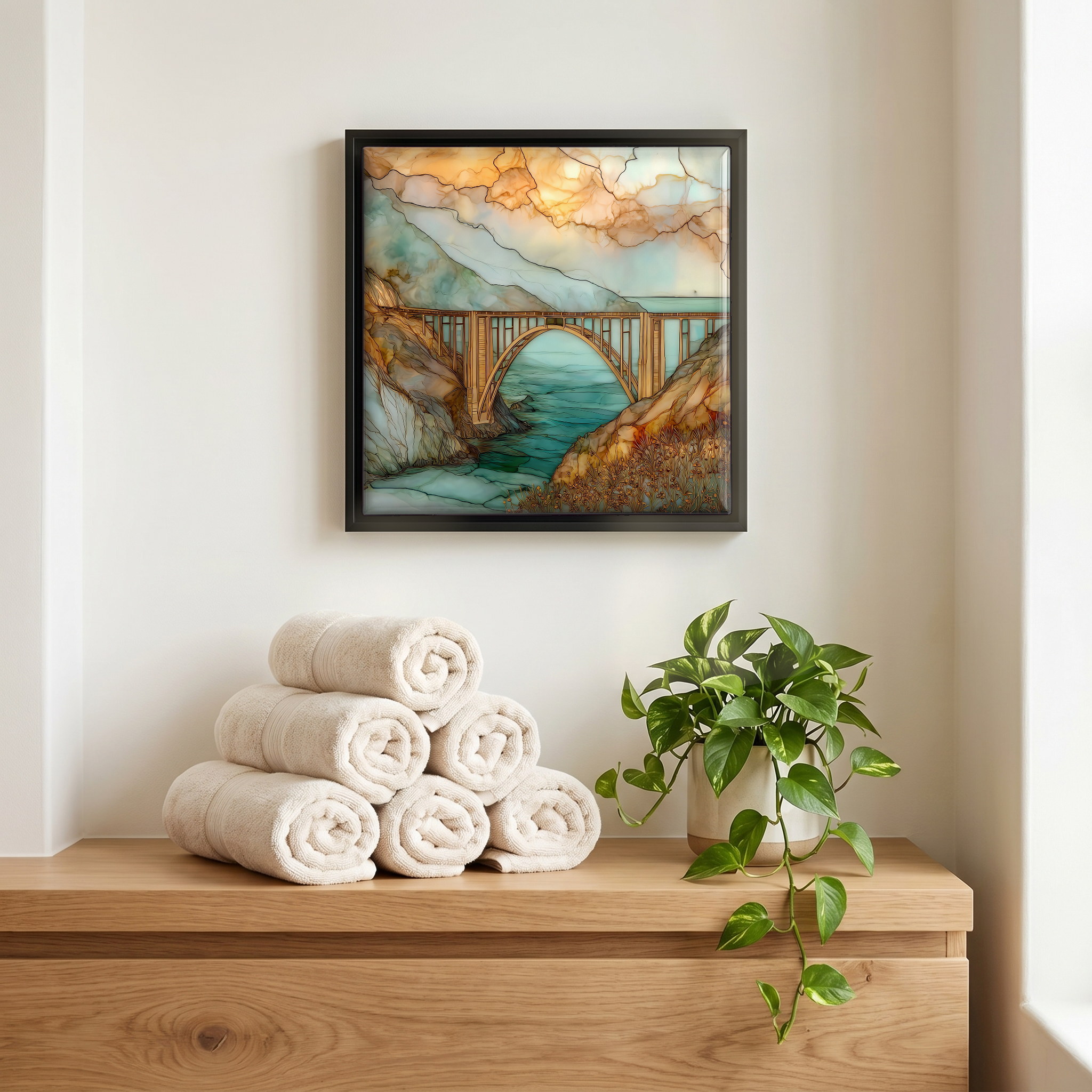 Above the linens, in a slim black surround.