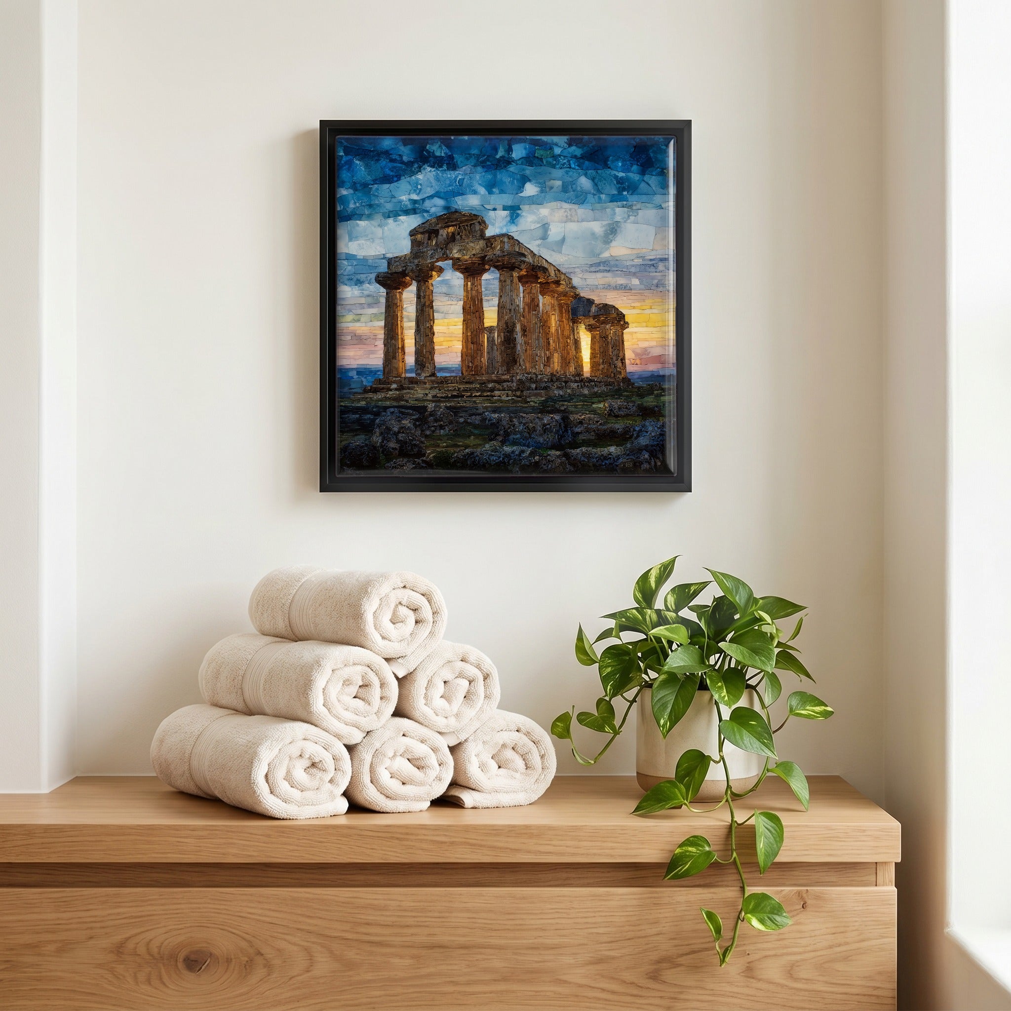Above the linens, in a slim black surround.