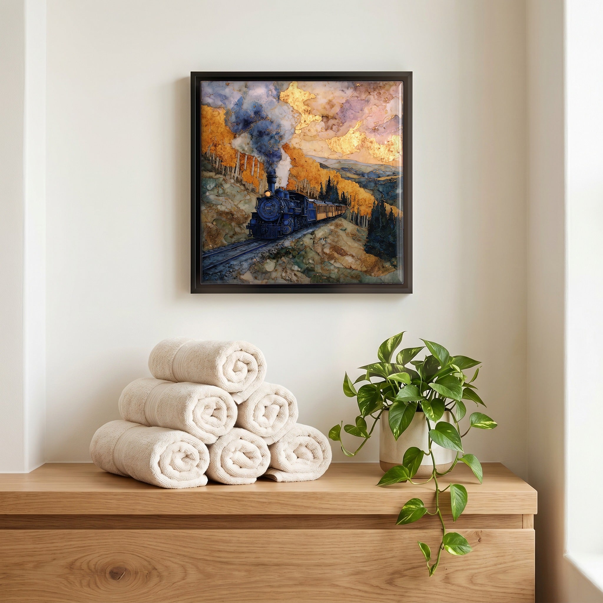 Above the linens, in a slim black surround.