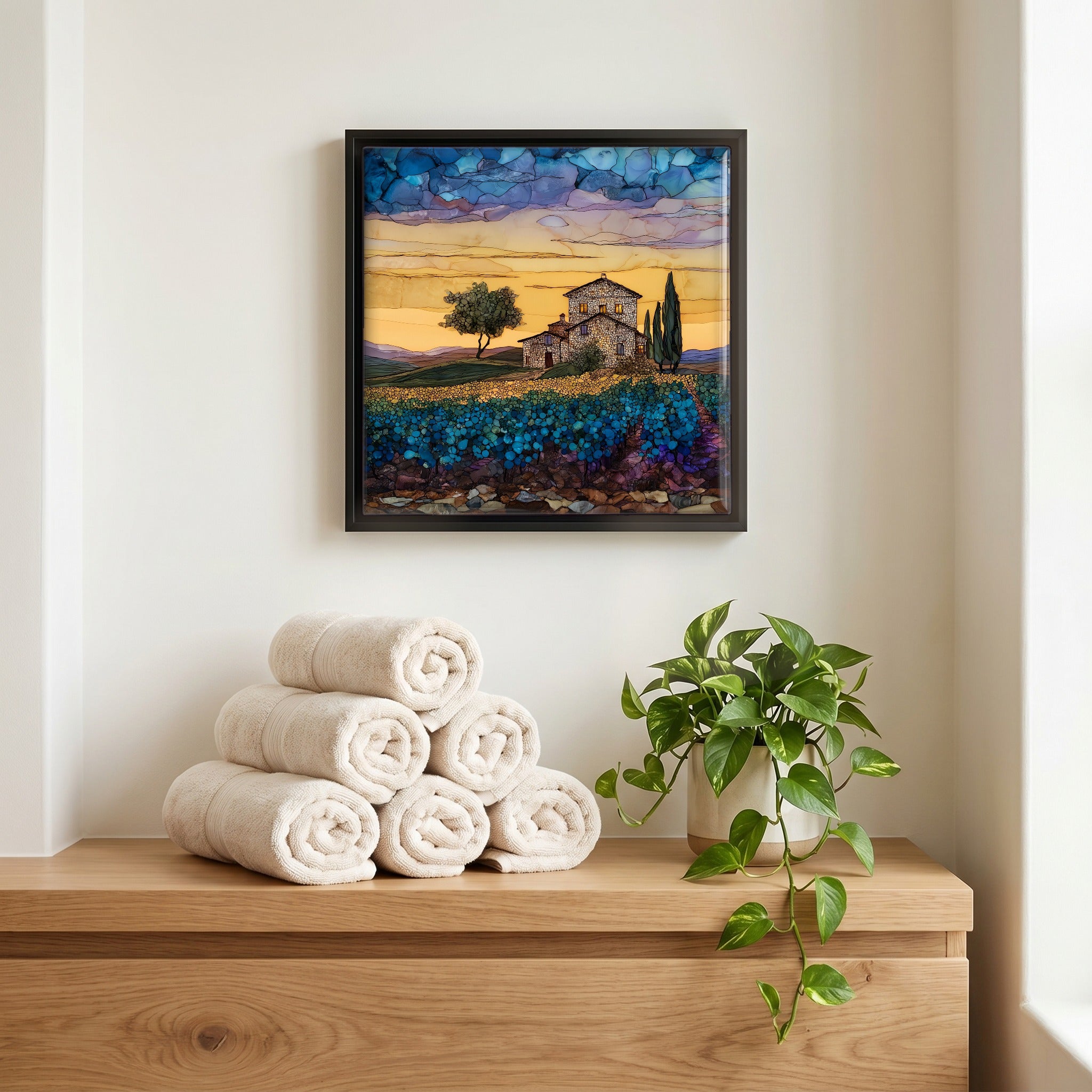 Above the linens, in a slim black surround.