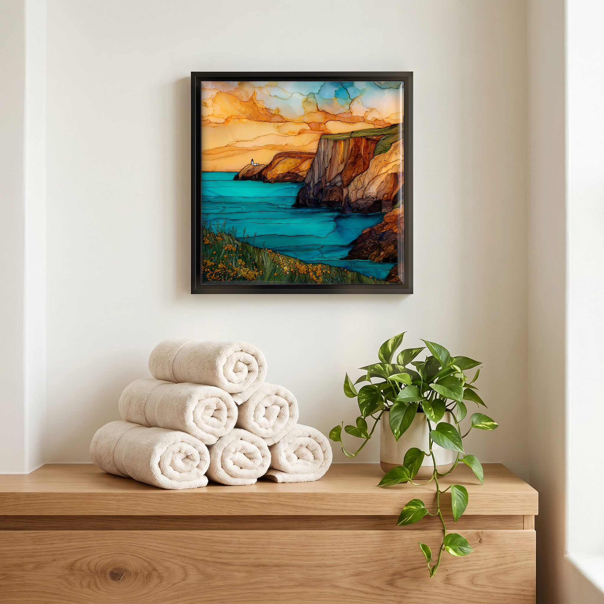 Above the linens, in a slim black surround.