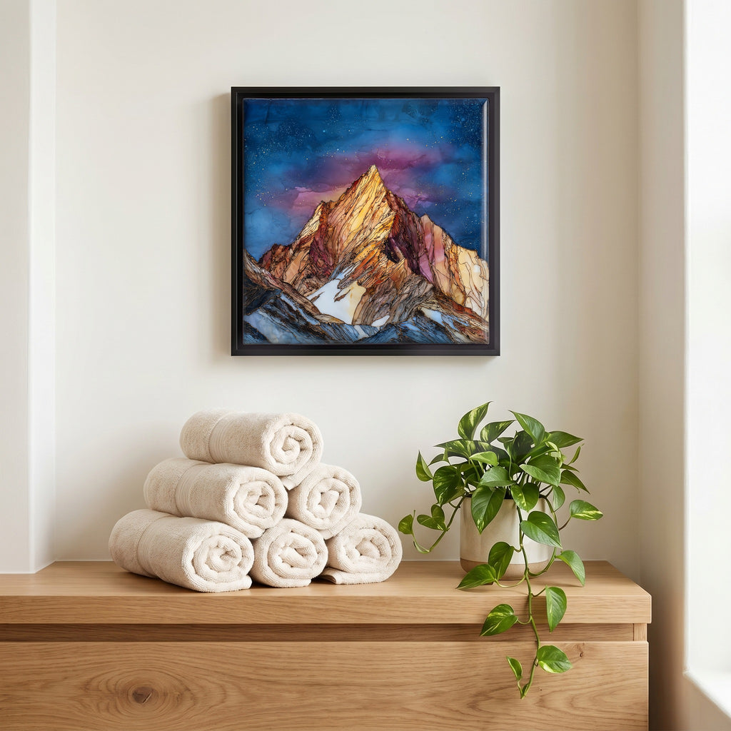 Above the linens, in a slim black surround.