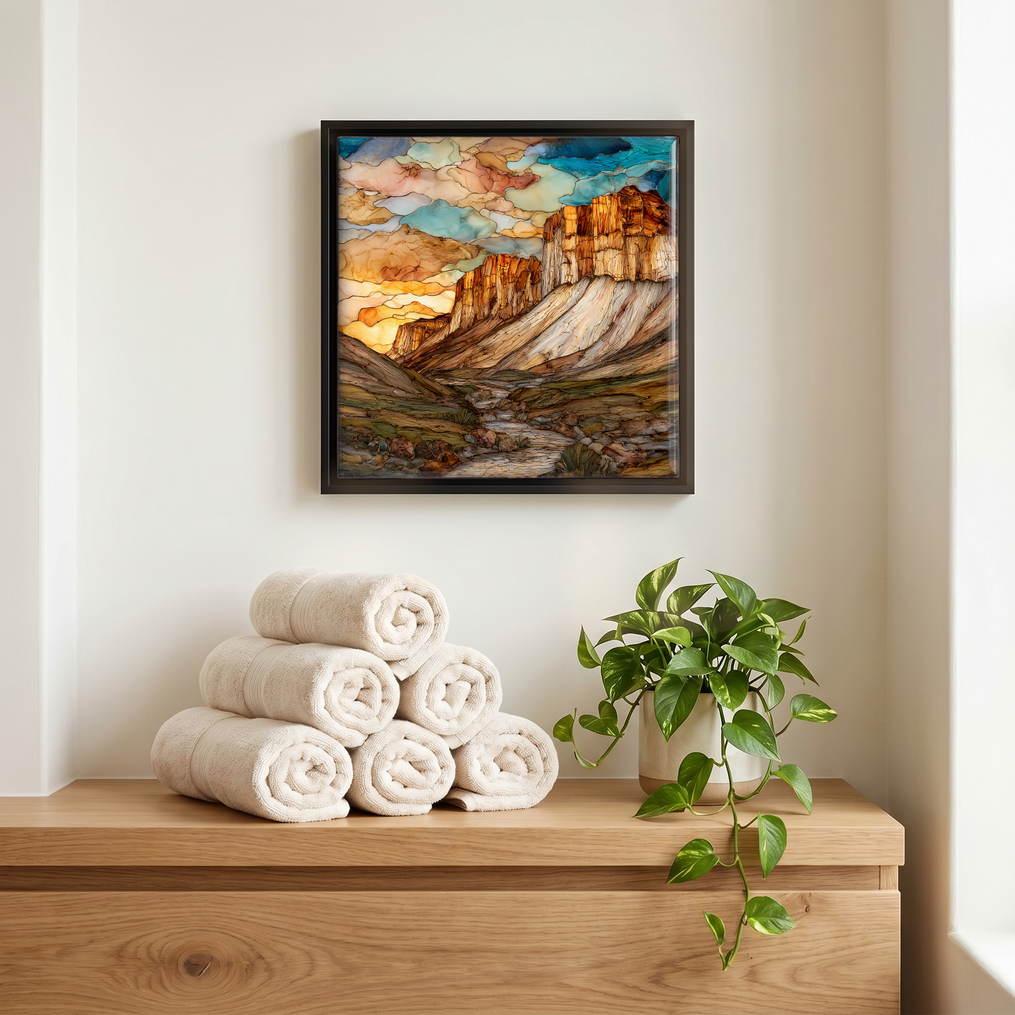 Above the linens, in a slim black surround.