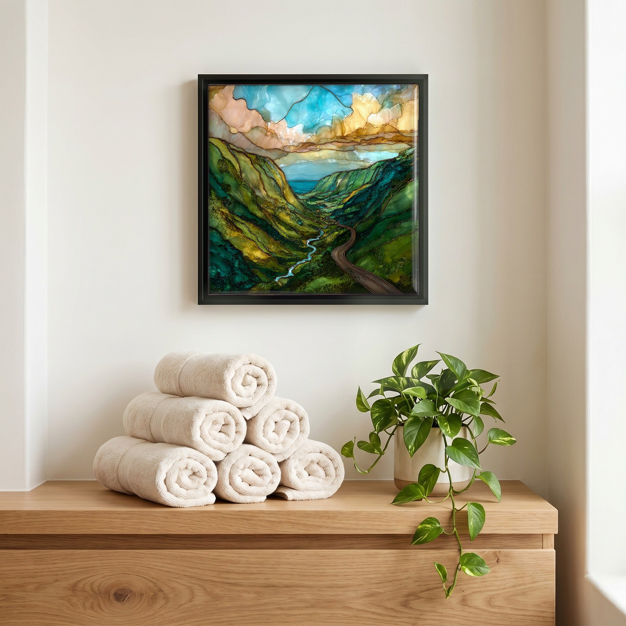 Above the linens, in a slim black surround.