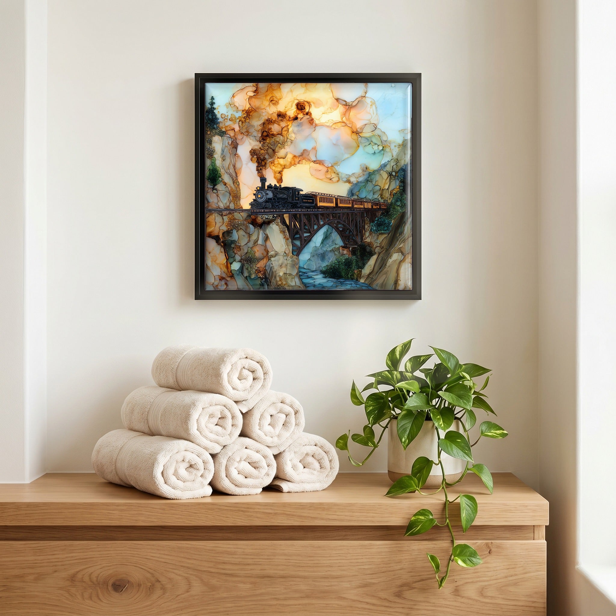 Above the linens, in a slim black surround.