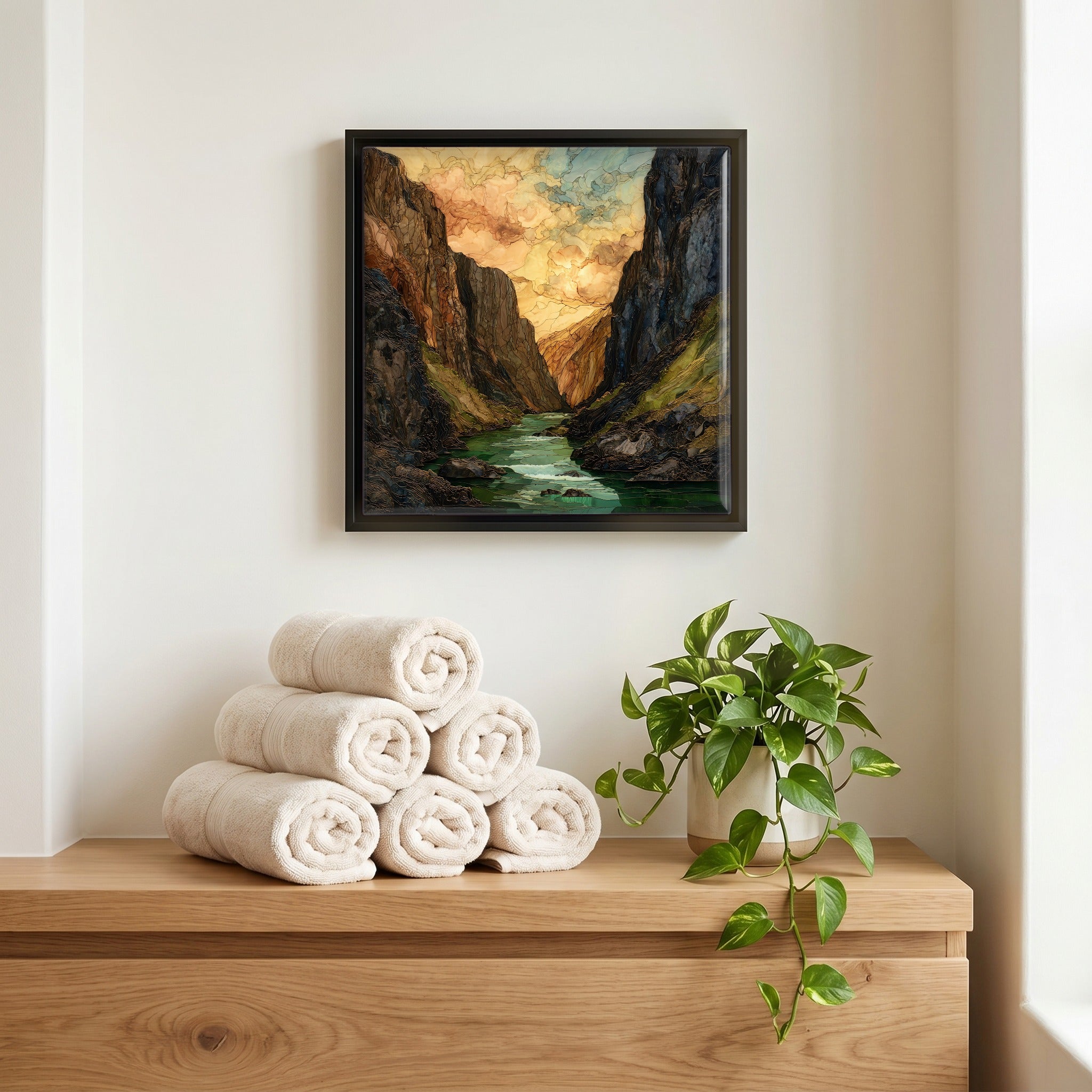 Above the linens, in a slim black surround.