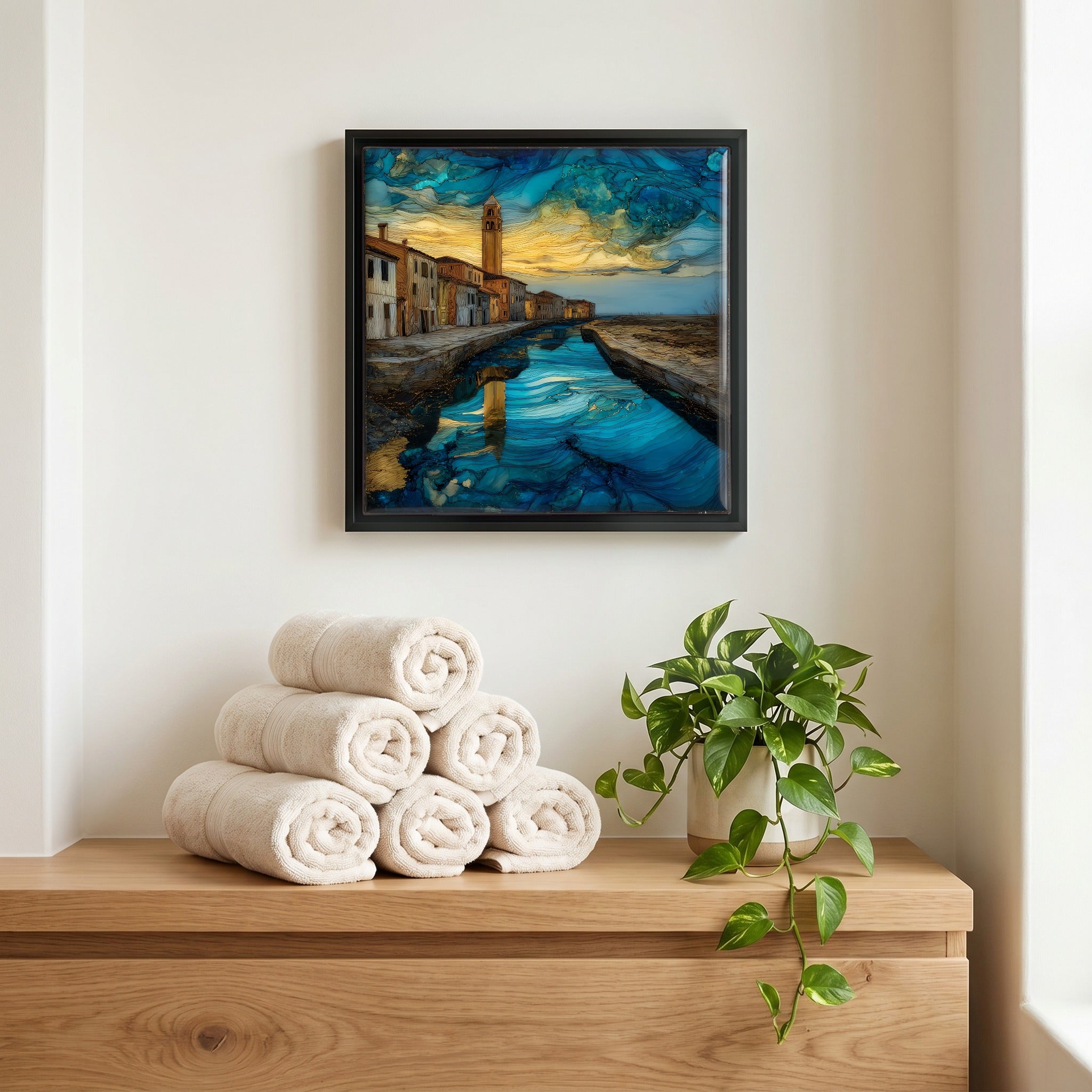 Above the linens, in a slim black surround.