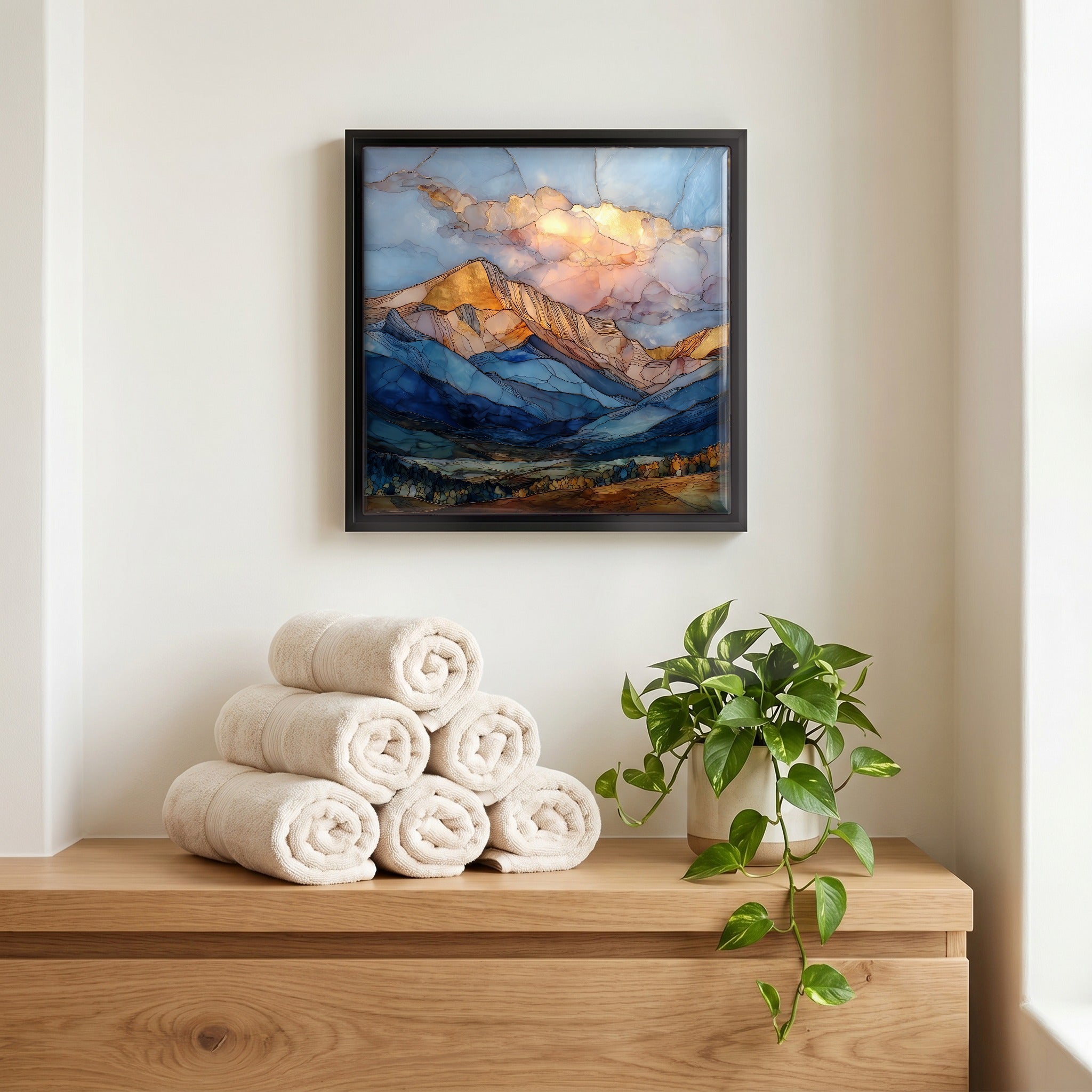 Above the linens, in a slim black surround.