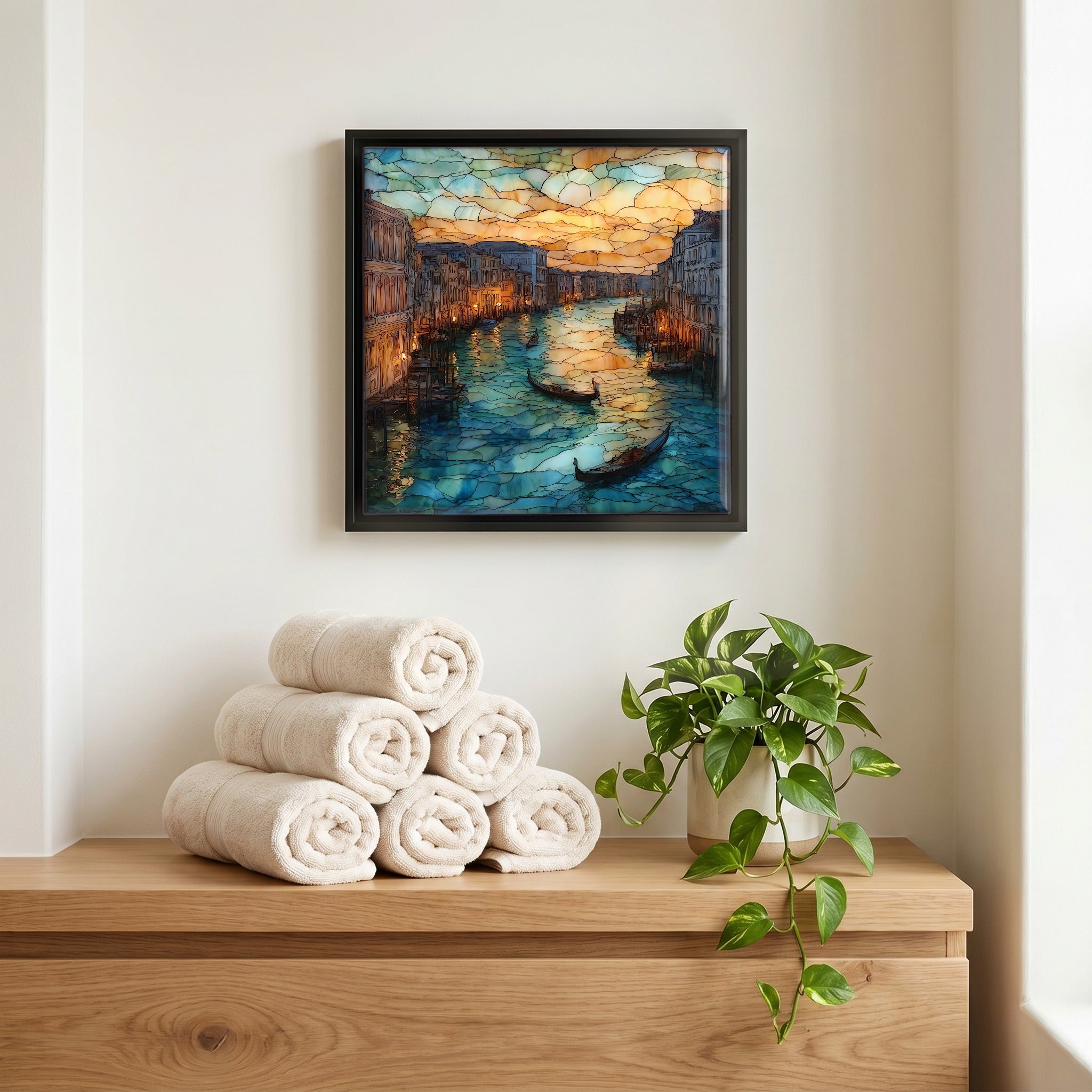 Above the linens, in a slim black surround.