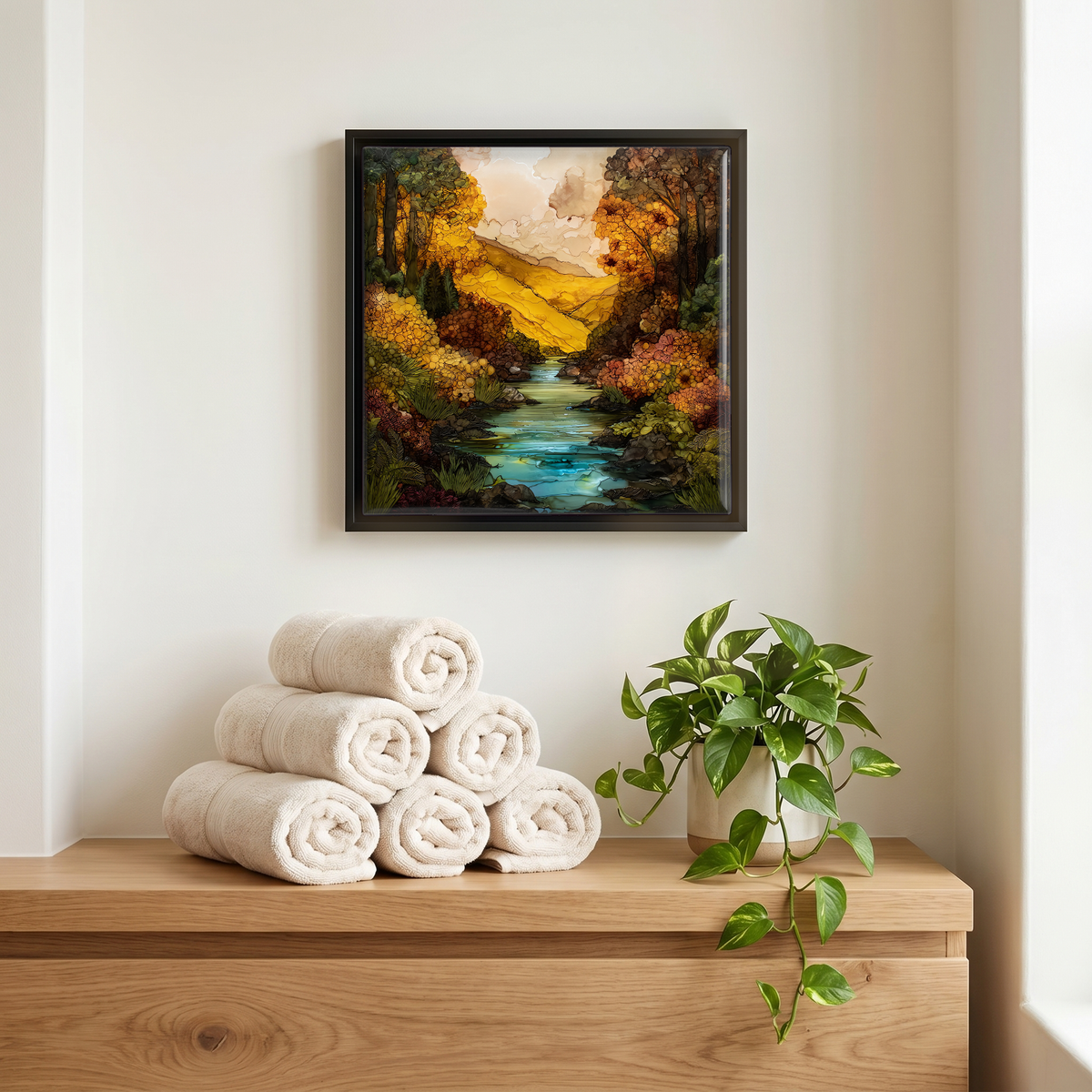Above the linens, in a slim black surround.