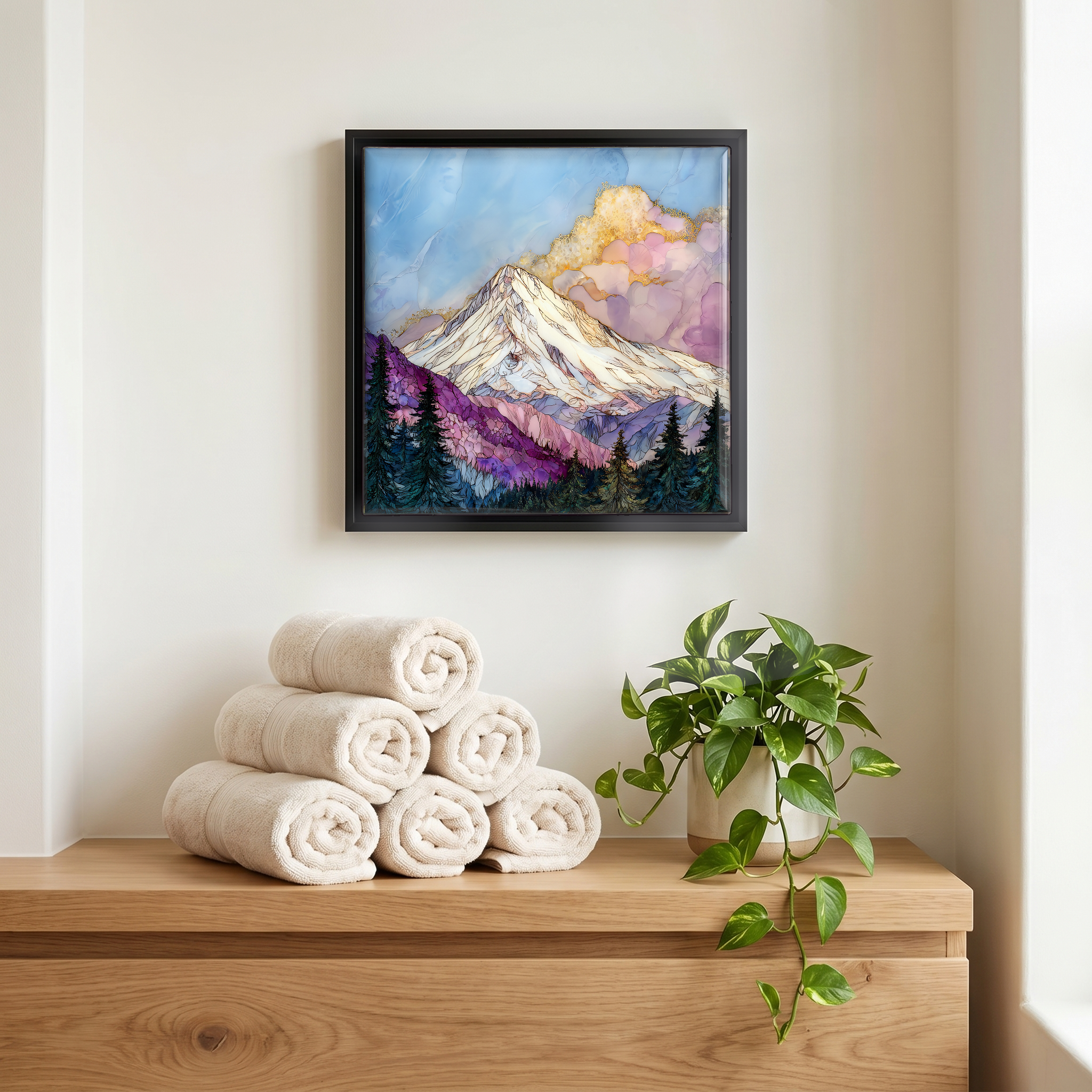 Above the linens, in a slim black surround.