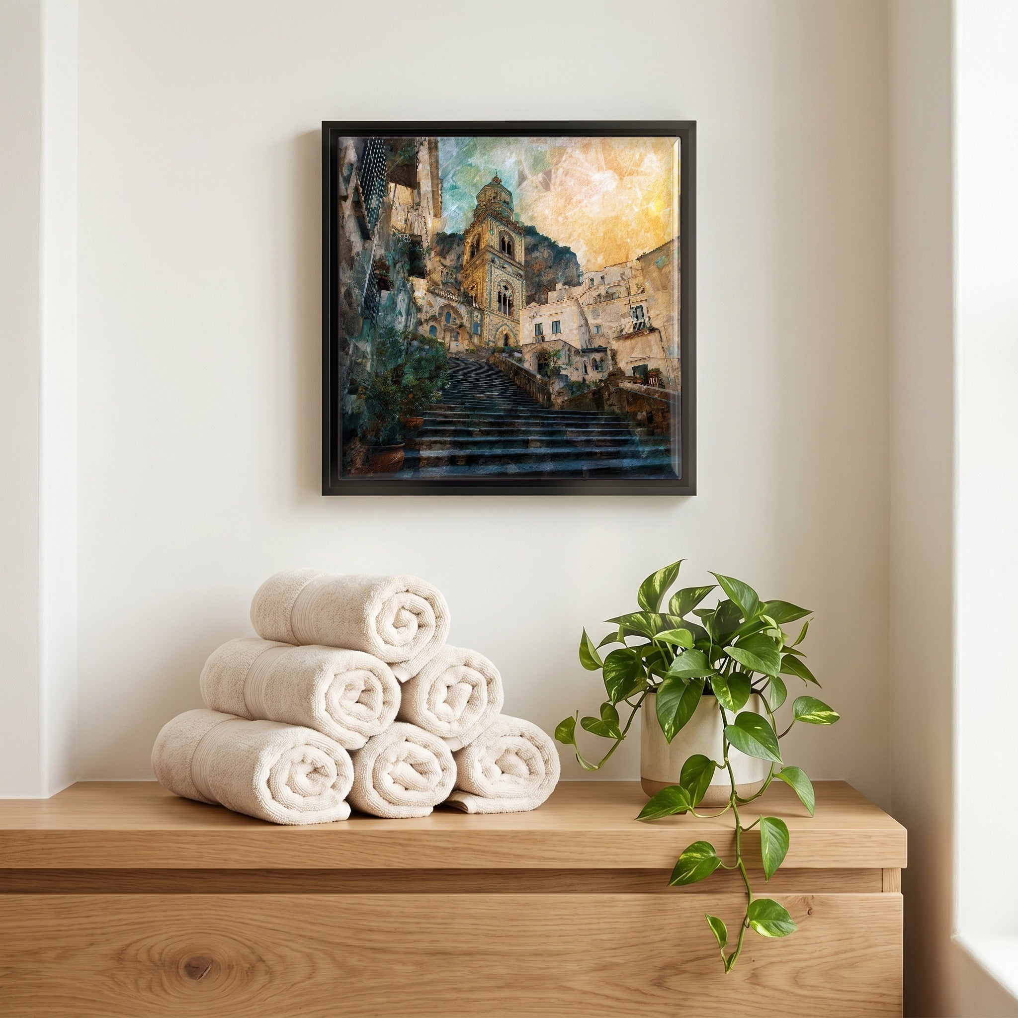 Above the linens, in a slim black surround.