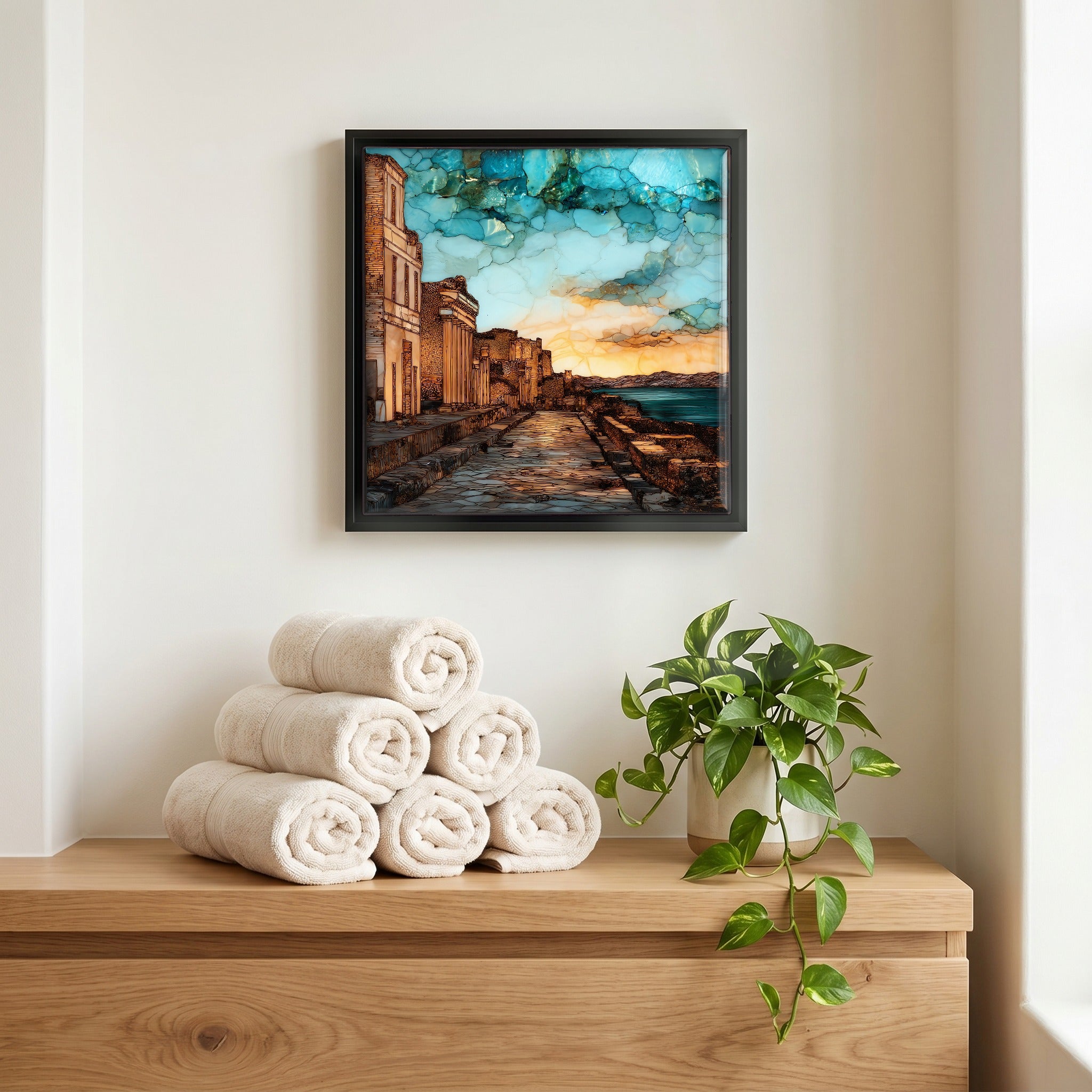 Above the linens, in a slim black surround.
