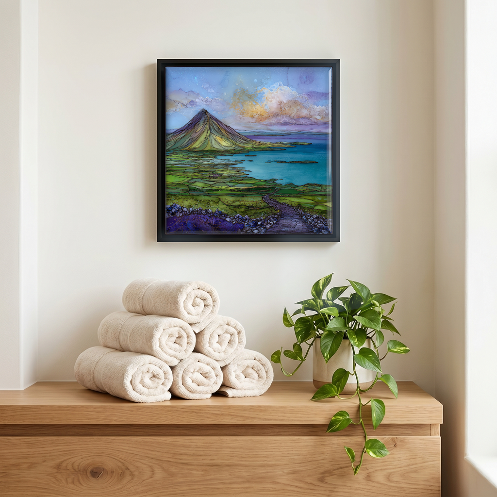 Above the linens, in a slim black surround.