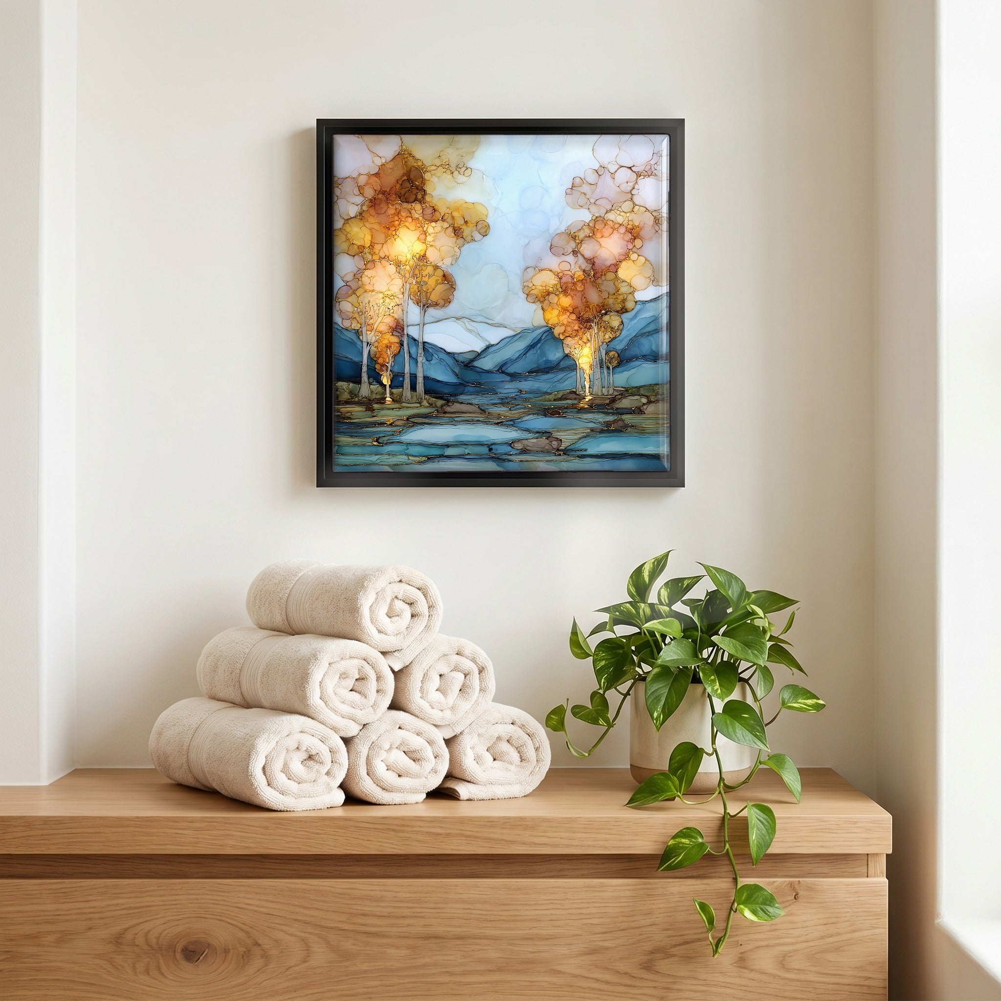 Above the linens, in a slim black surround.