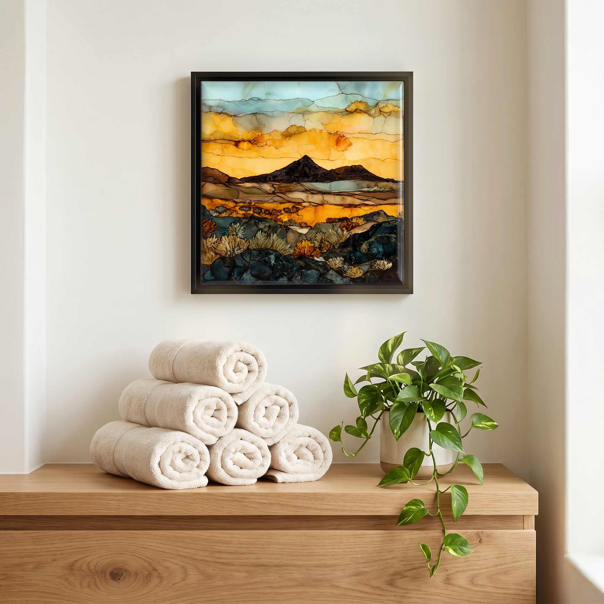Above the linens, in a slim black surround.