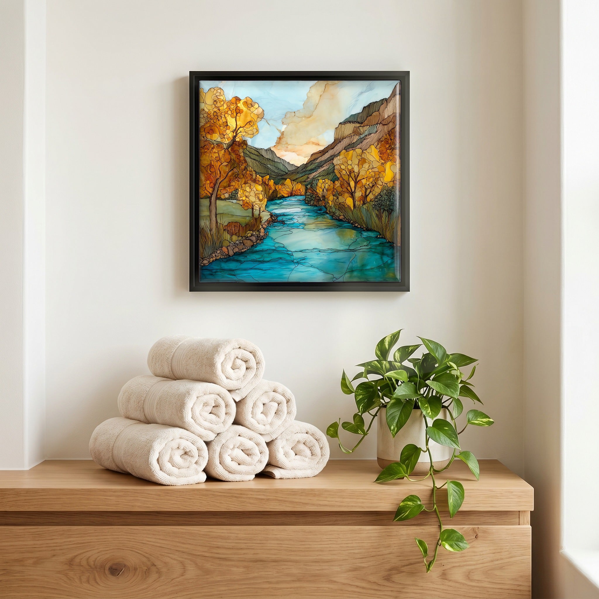 Above the linens, in a slim black surround.