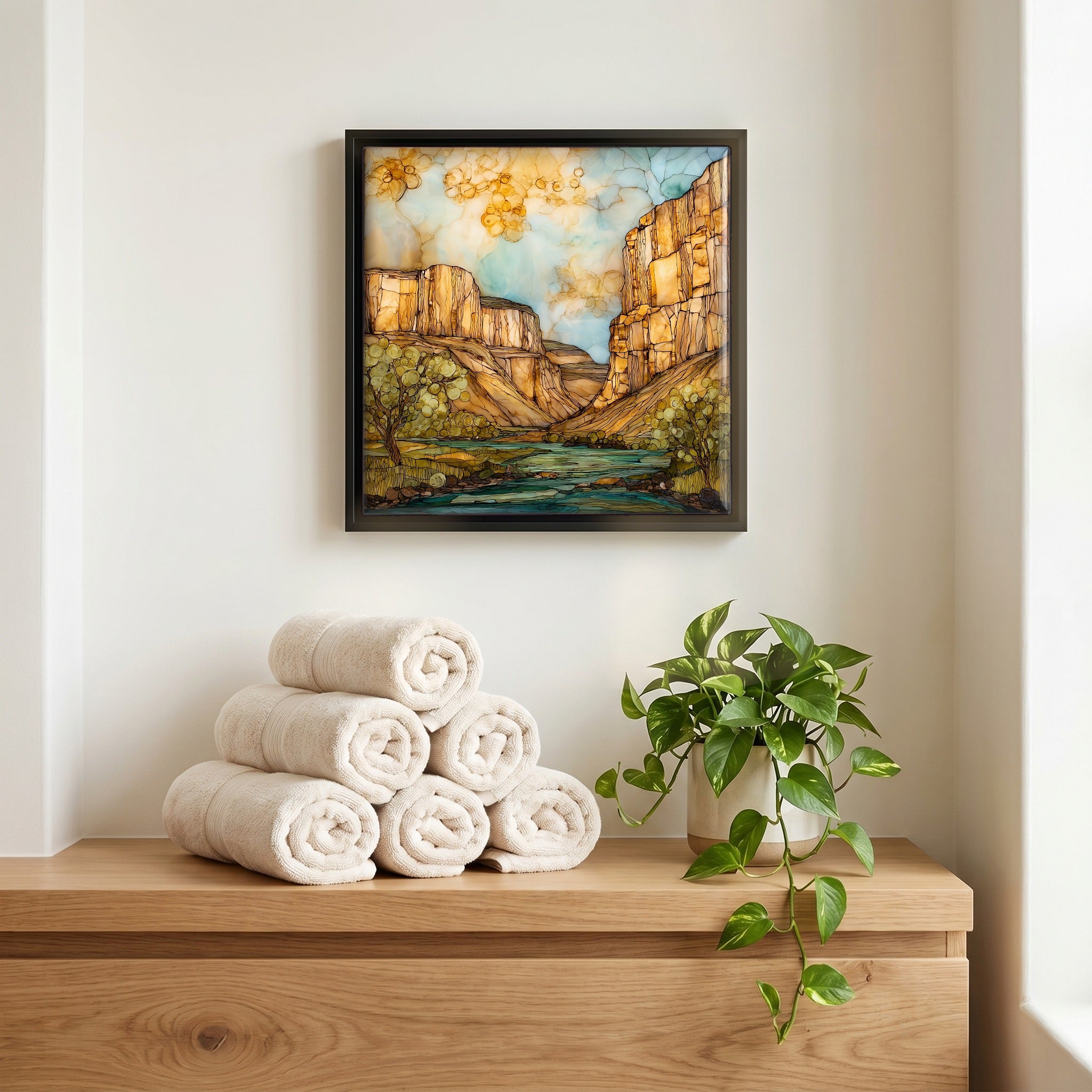 Above the linens, in a slim black surround.