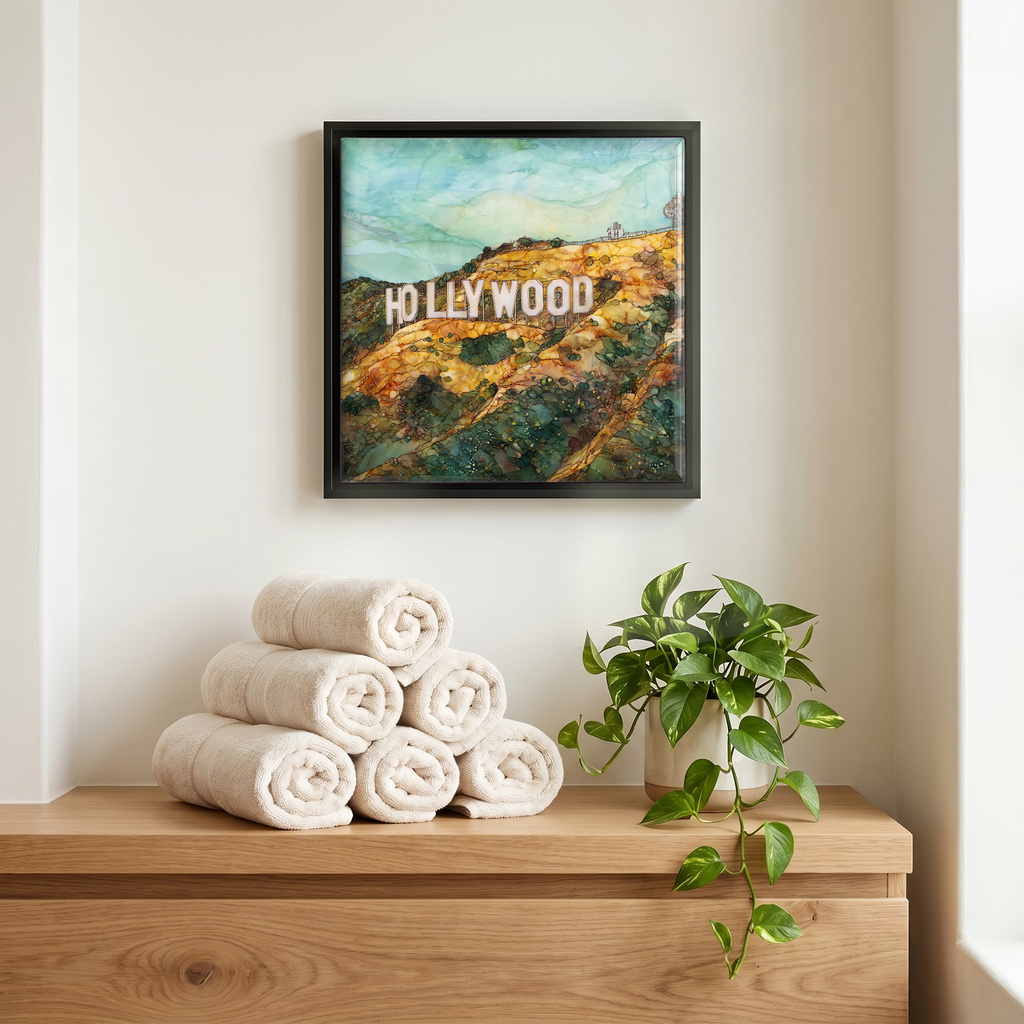 Above the linens, in a slim black surround.