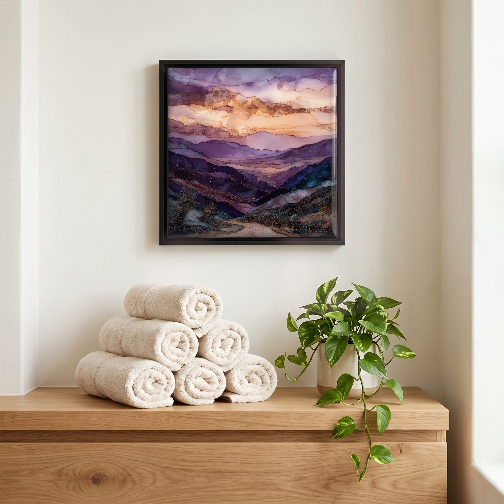 Above the linens, in a slim black surround.