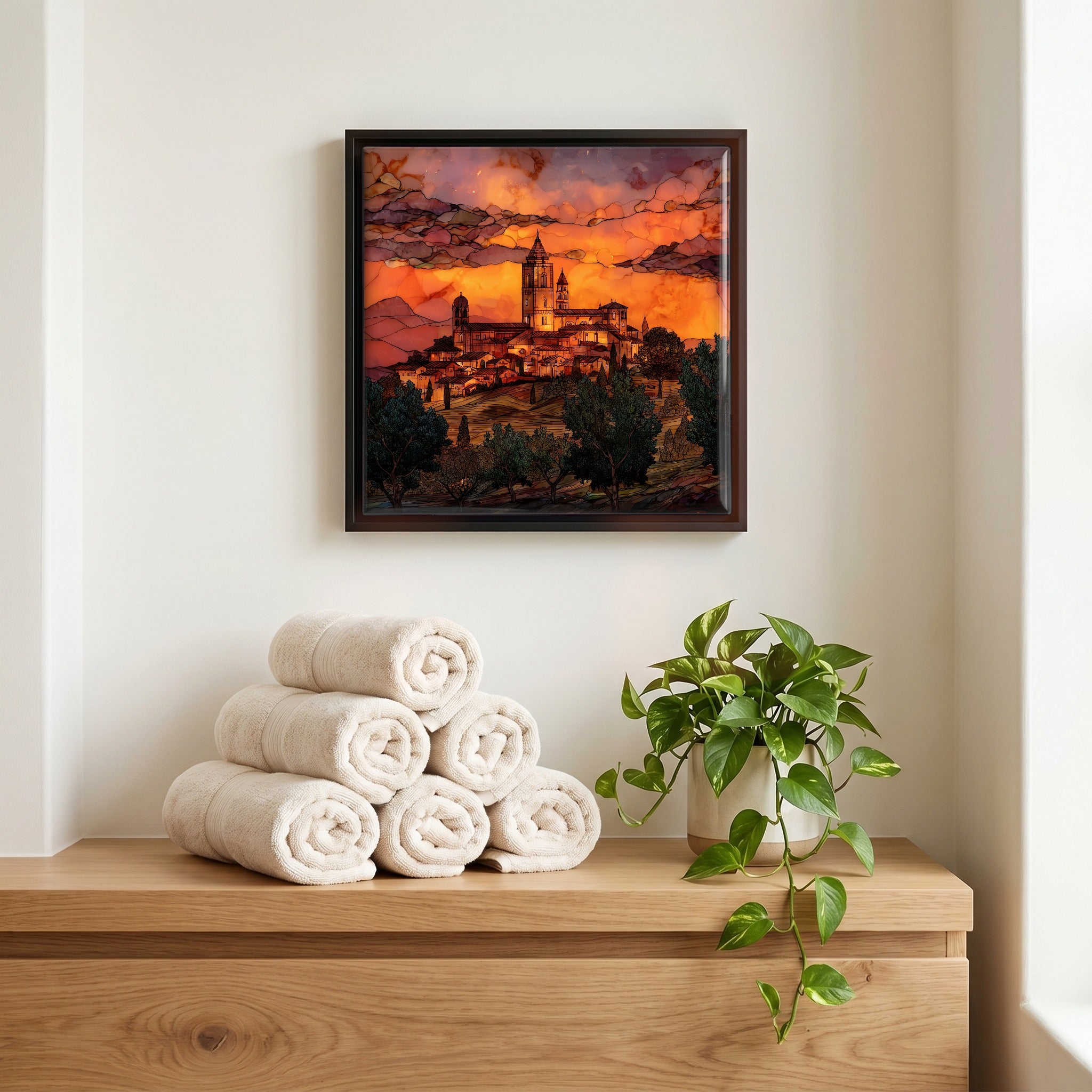 Above the linens, in a slim black surround.