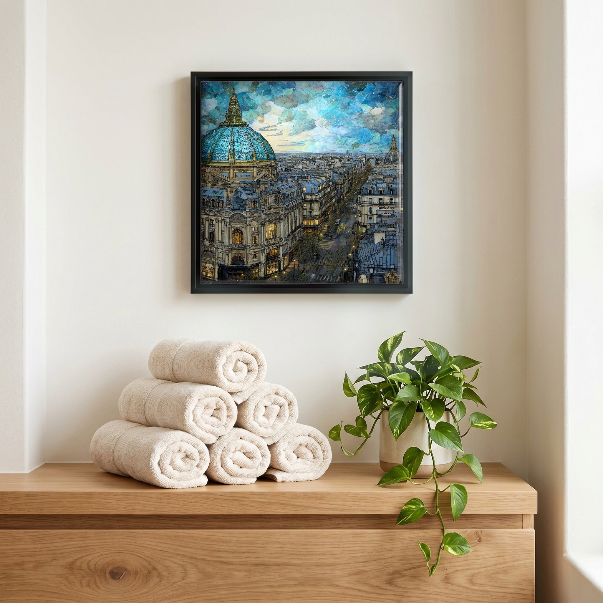 Above the linens, in a slim black surround.