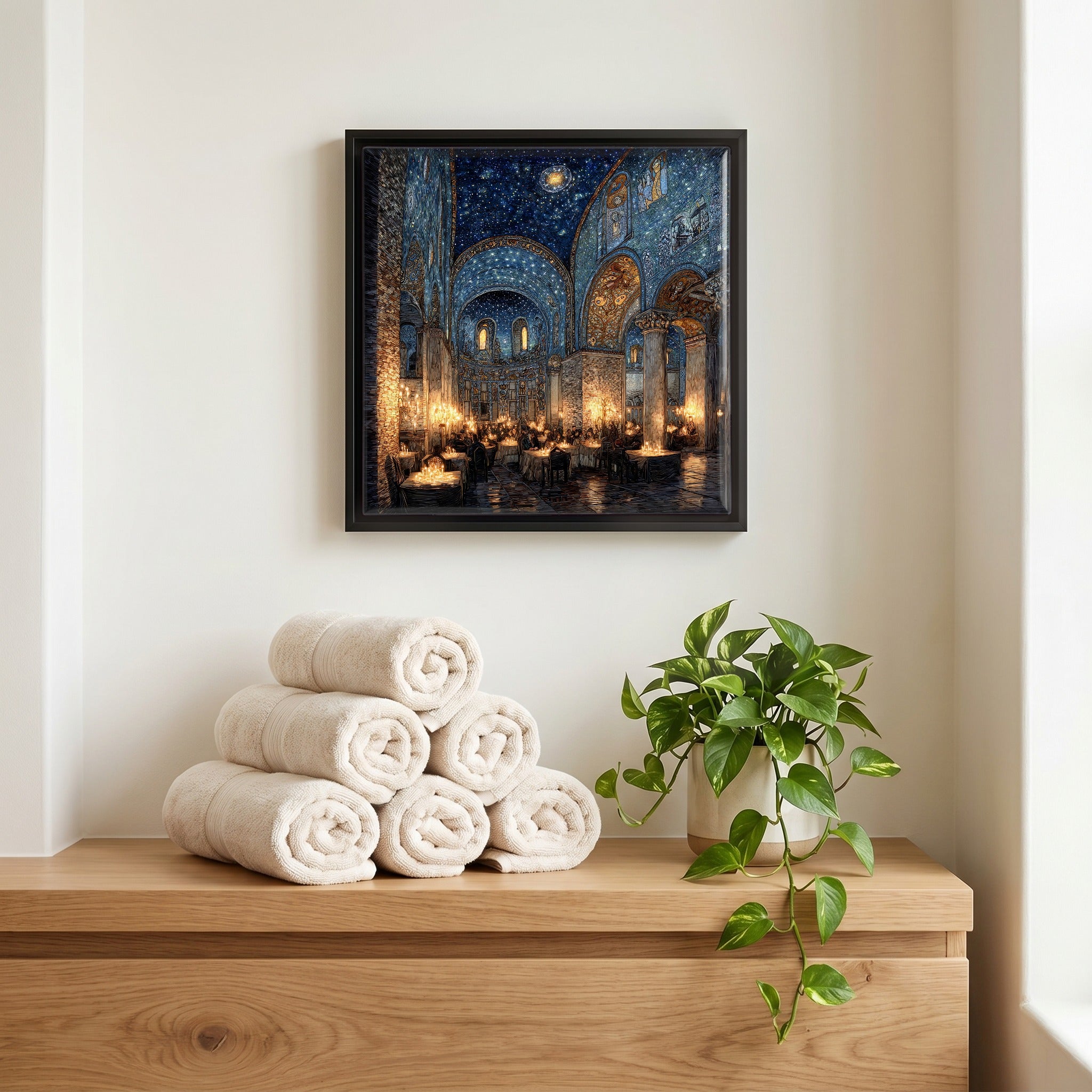 Above the linens, in a slim black surround.